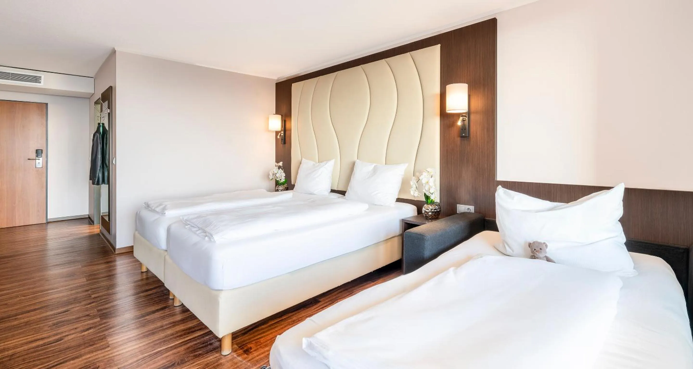 Bed in PLAZA Hotel Föhr am Bodensee