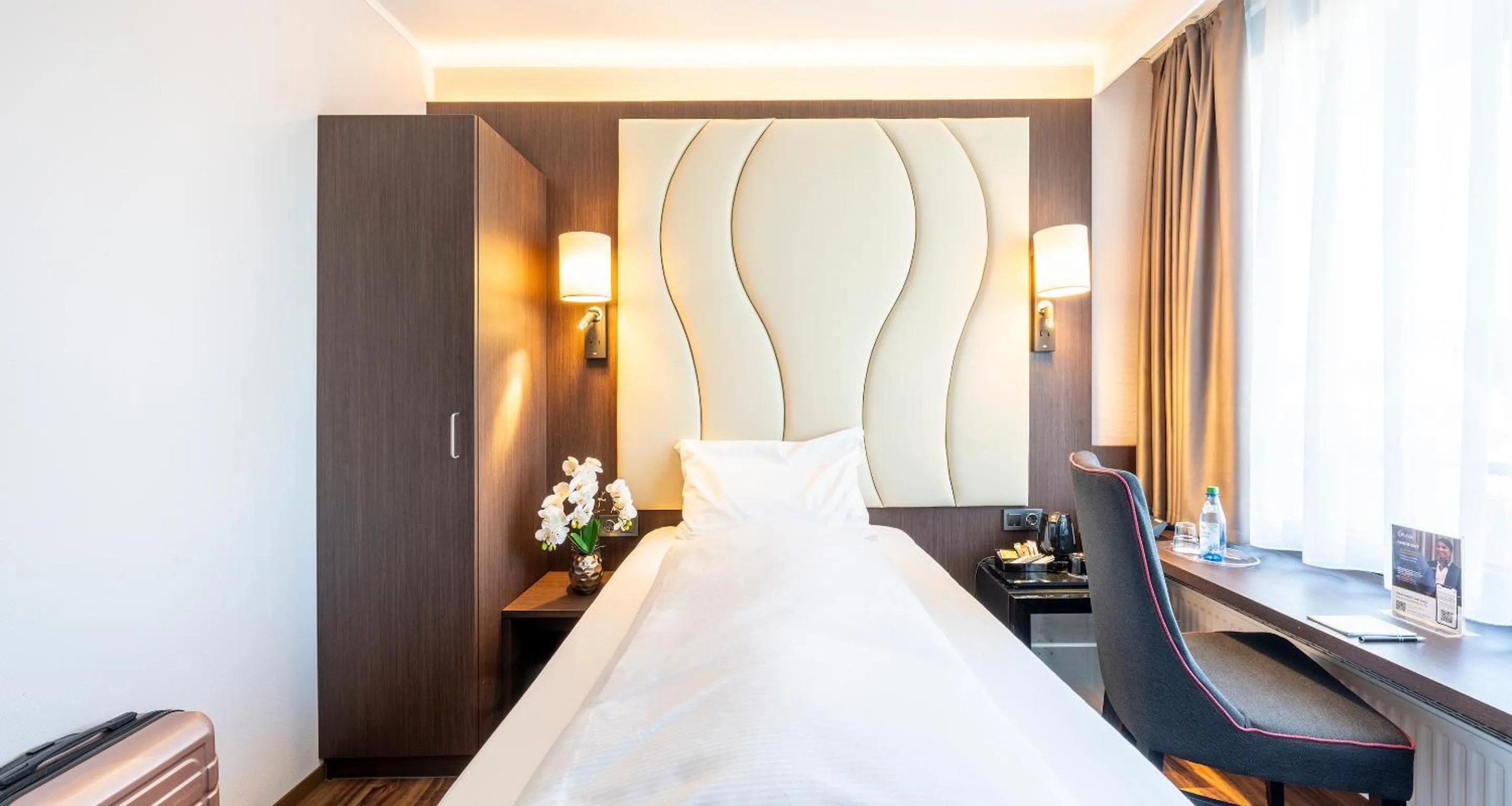 Bed in PLAZA Hotel Föhr am Bodensee