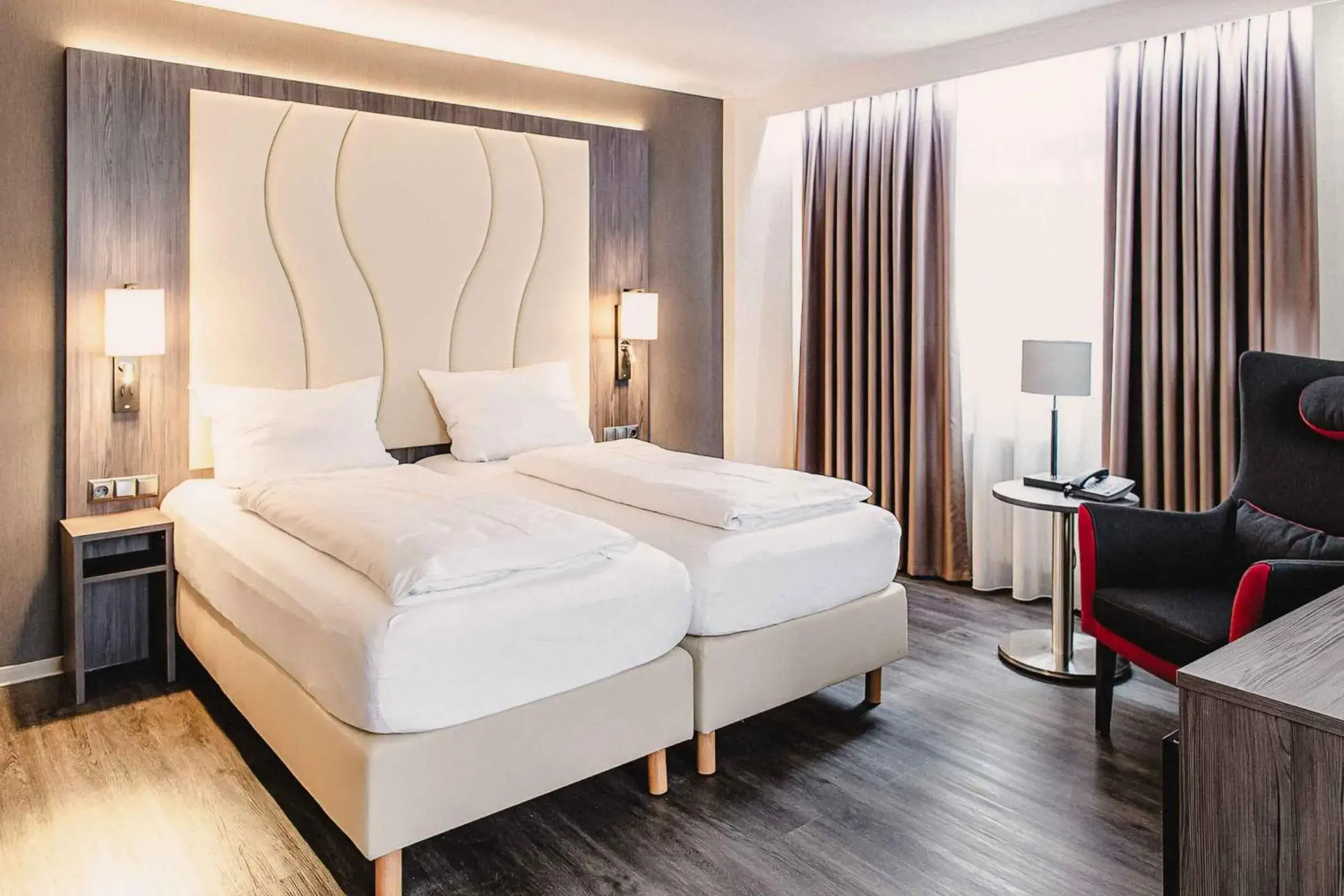 Bed in PLAZA Hotel Buchhorner Hof Bed in PLAZA Hotel Buchhorner Hof