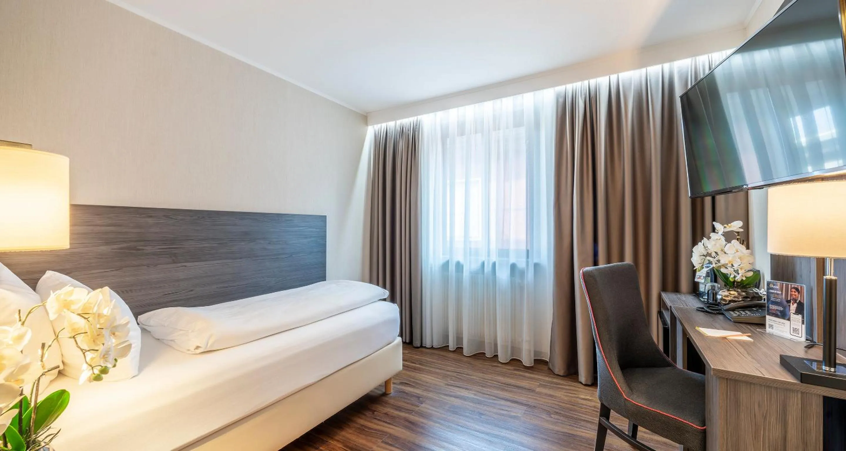 Bed in PLAZA Hotel Buchhorner Hof