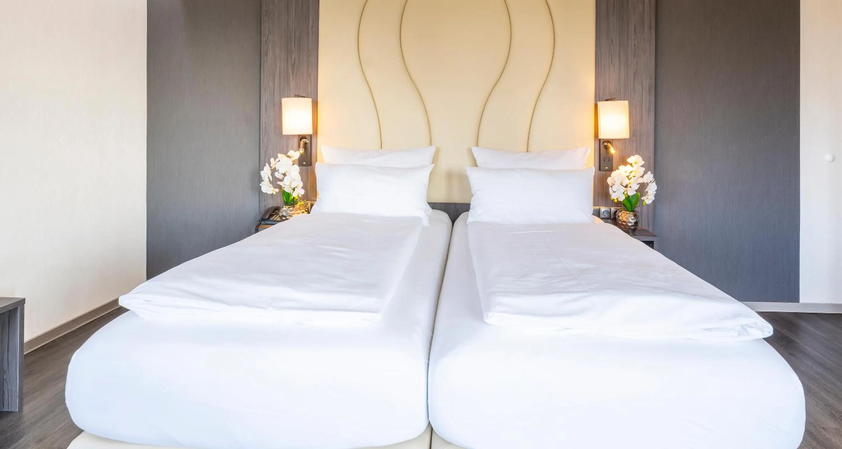 Bed in PLAZA Hotel Buchhorner Hof