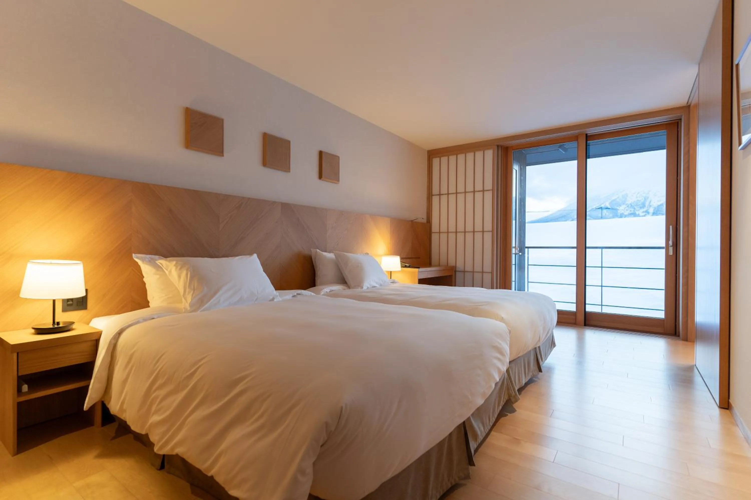 Photo of the whole room, Bed in NISEKO Inn of Youtei Raku Suisan