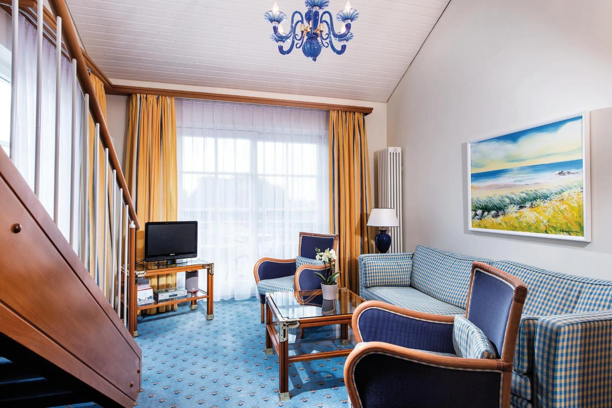 Photo of the whole room in Hotel Kleine Strandburg - Adults Only