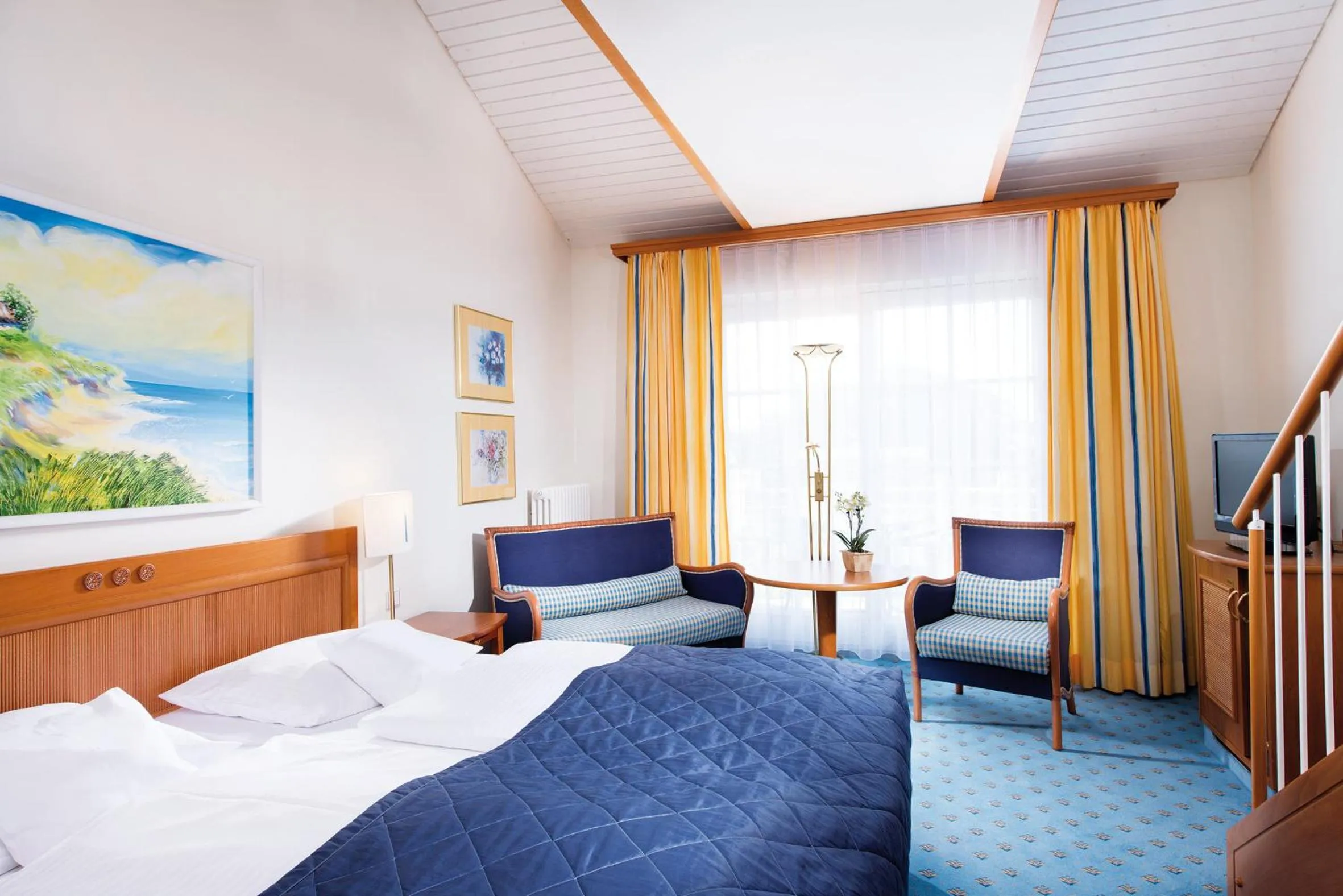 Photo of the whole room, Bed in Hotel Kleine Strandburg - Adults Only