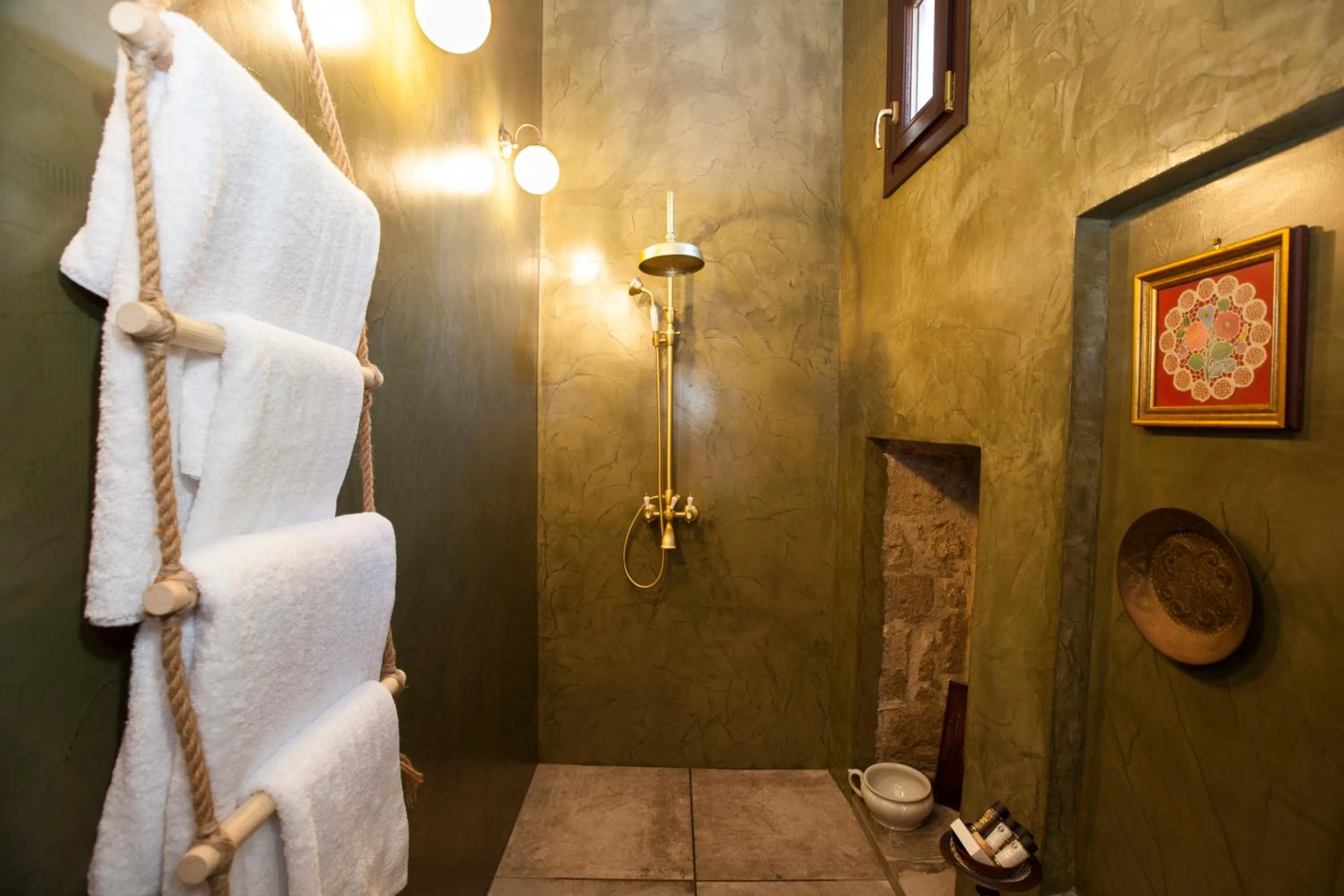 Bathroom in Porolithos Boutique Hotel