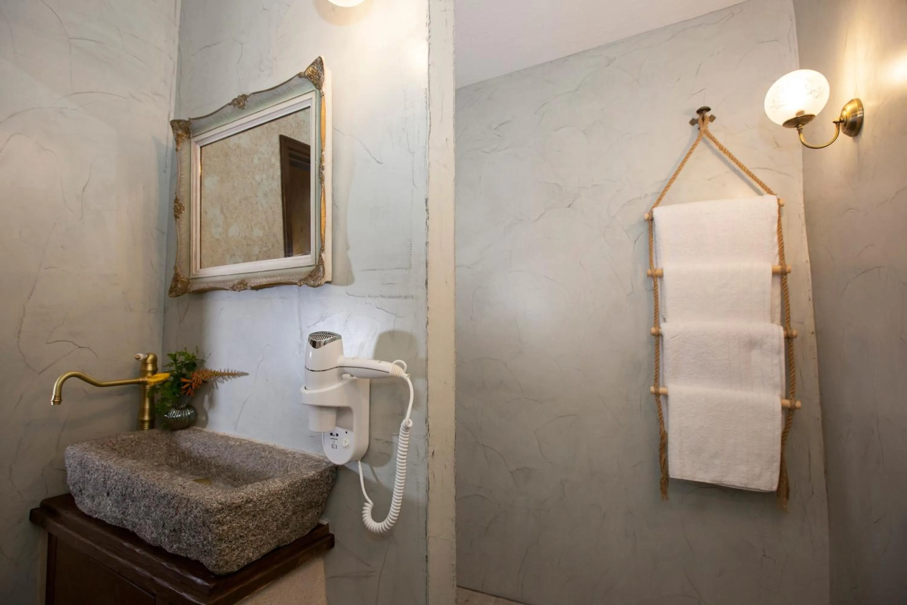 Bathroom in Porolithos Boutique Hotel