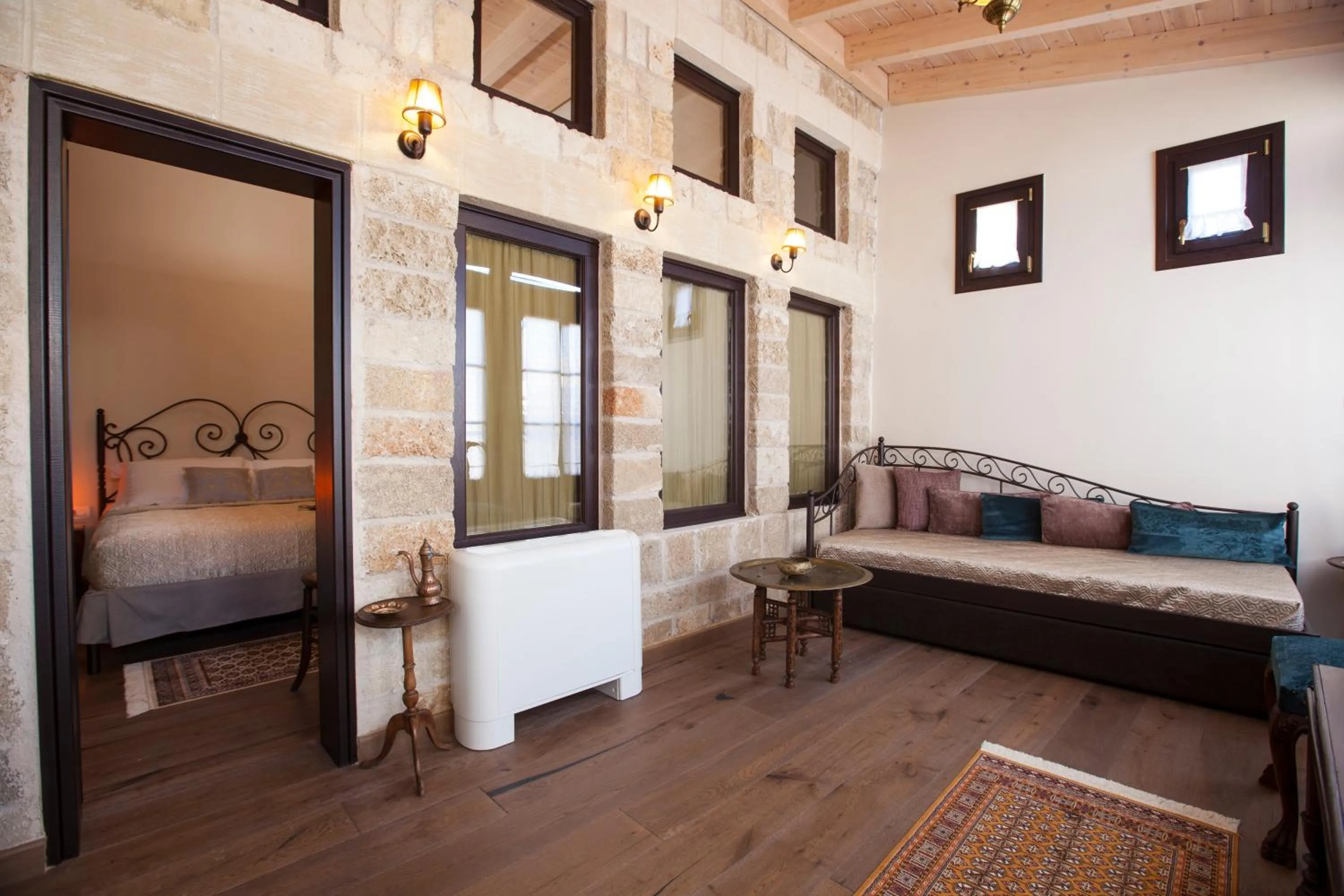 Living room, Bed in Porolithos Boutique Hotel