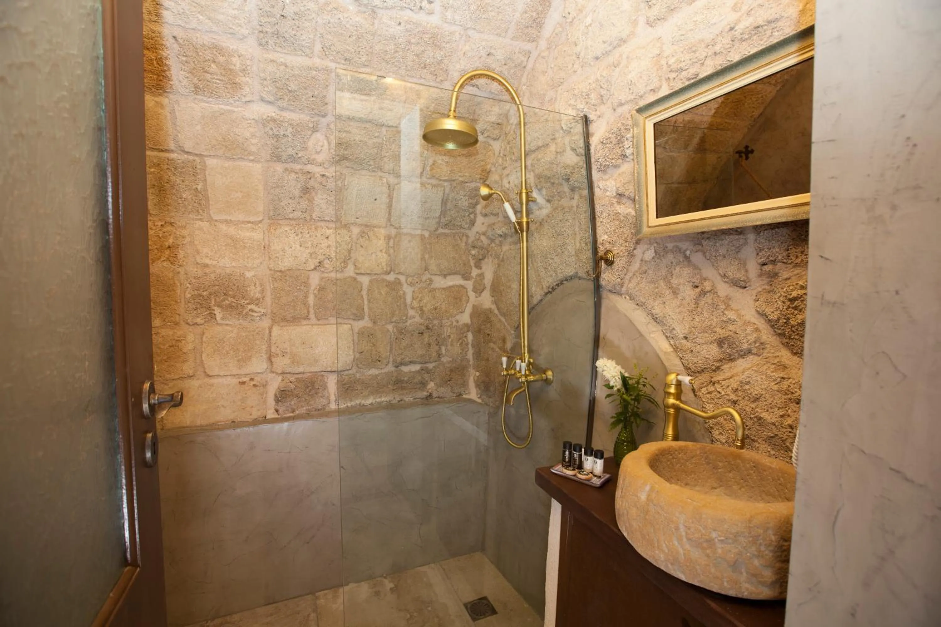 Bathroom in Porolithos Boutique Hotel