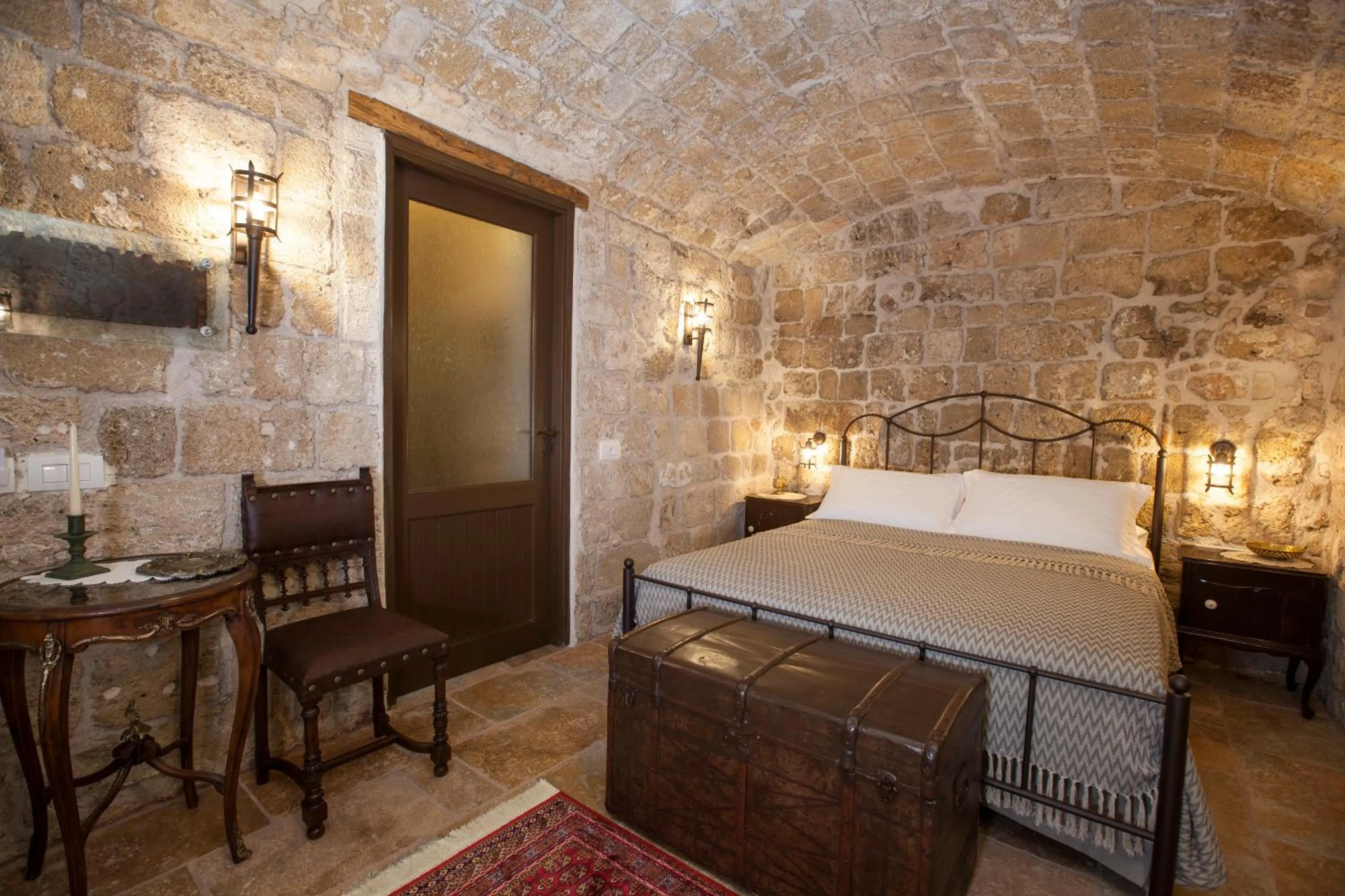 Photo of the whole room, Bed in Porolithos Boutique Hotel