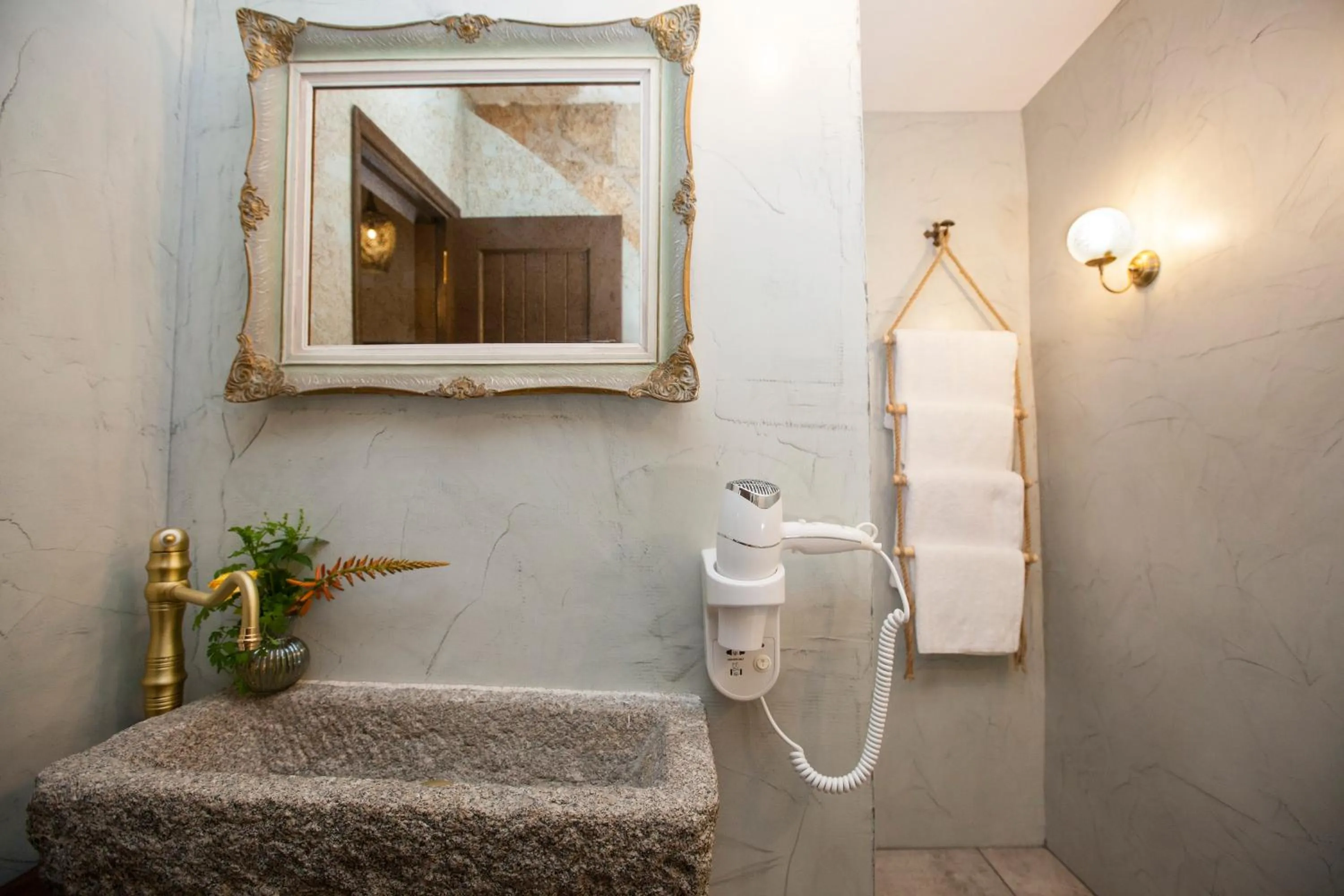 Bathroom in Porolithos Boutique Hotel