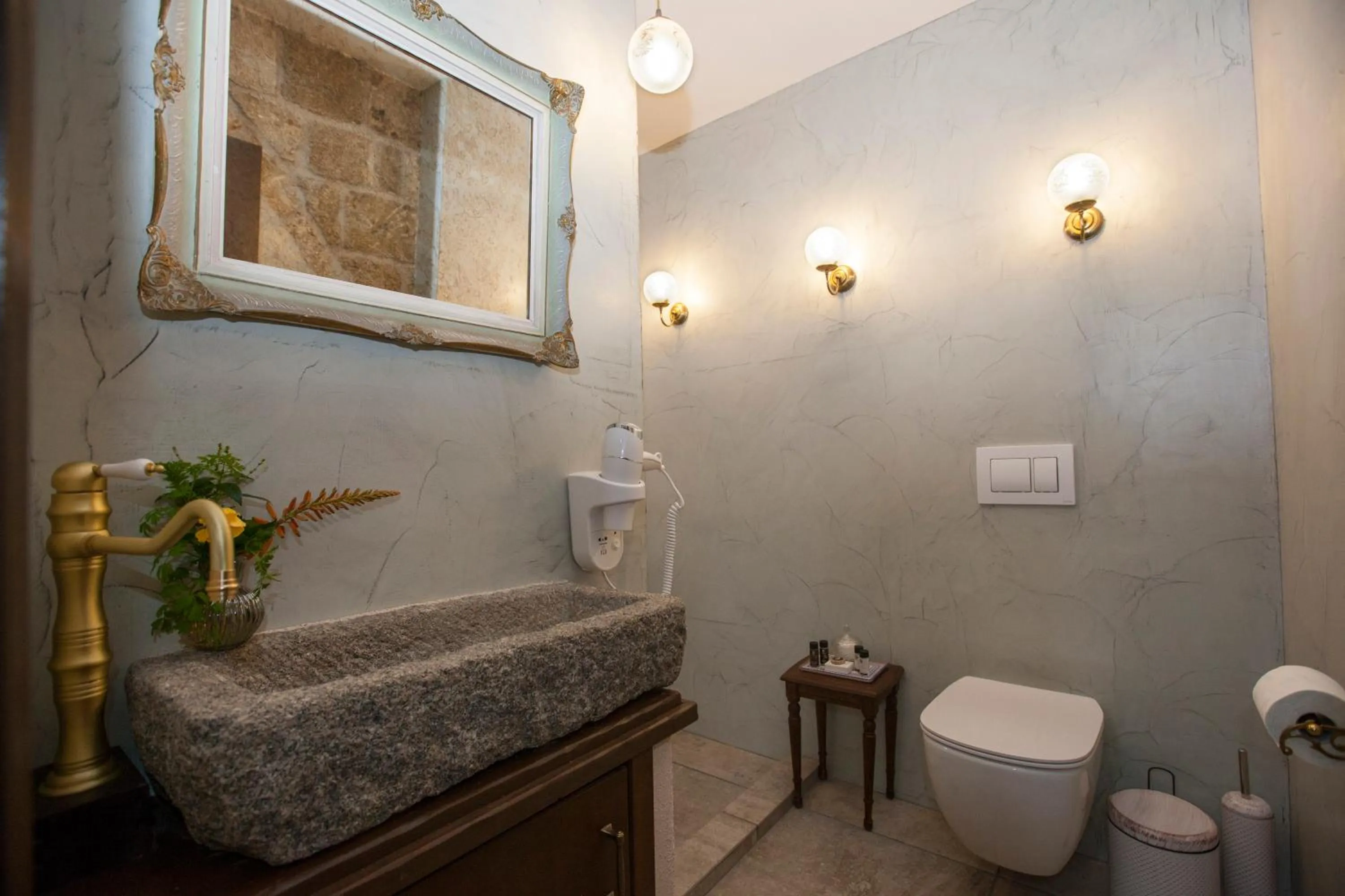 Bathroom in Porolithos Boutique Hotel