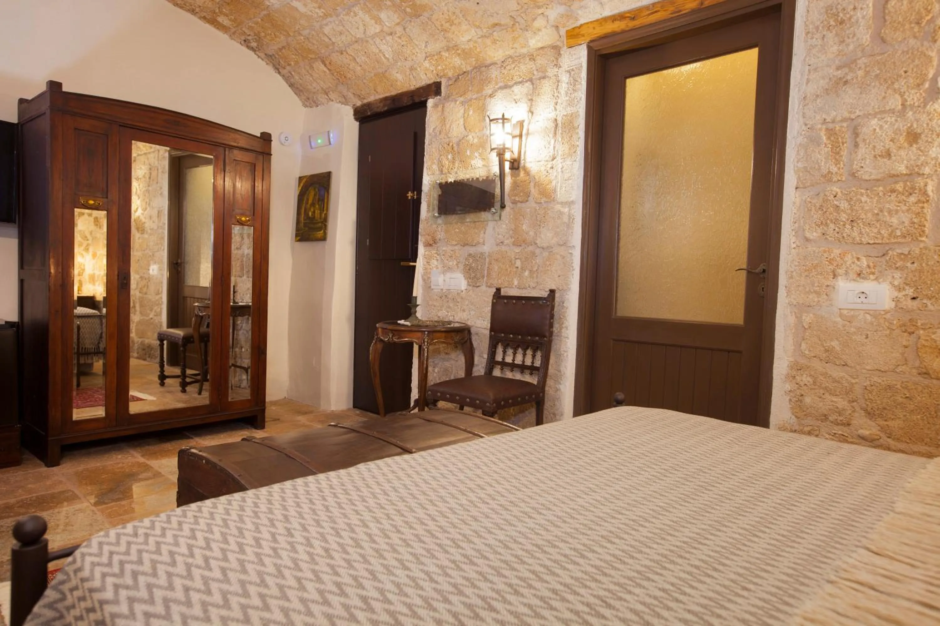 Photo of the whole room, Bed in Porolithos Boutique Hotel