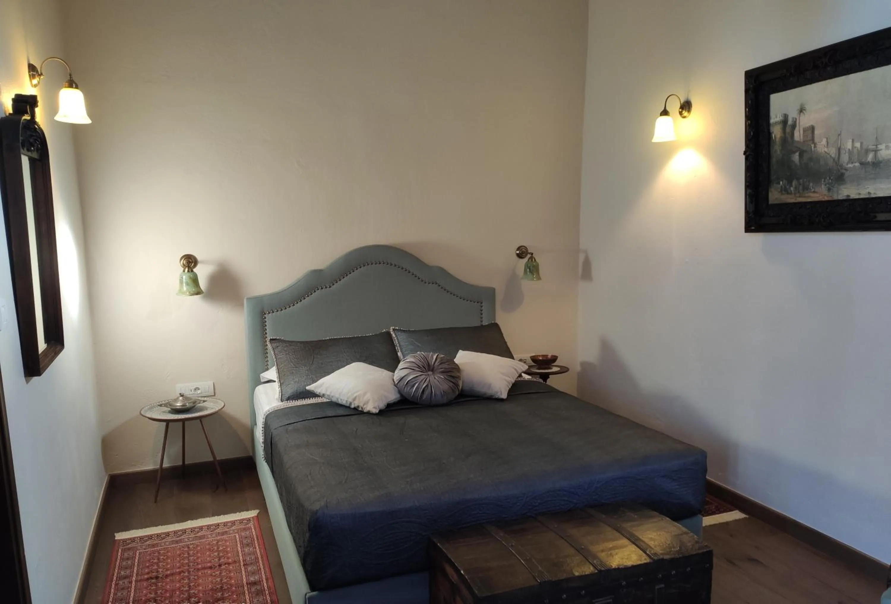 Bed in Porolithos Boutique Hotel