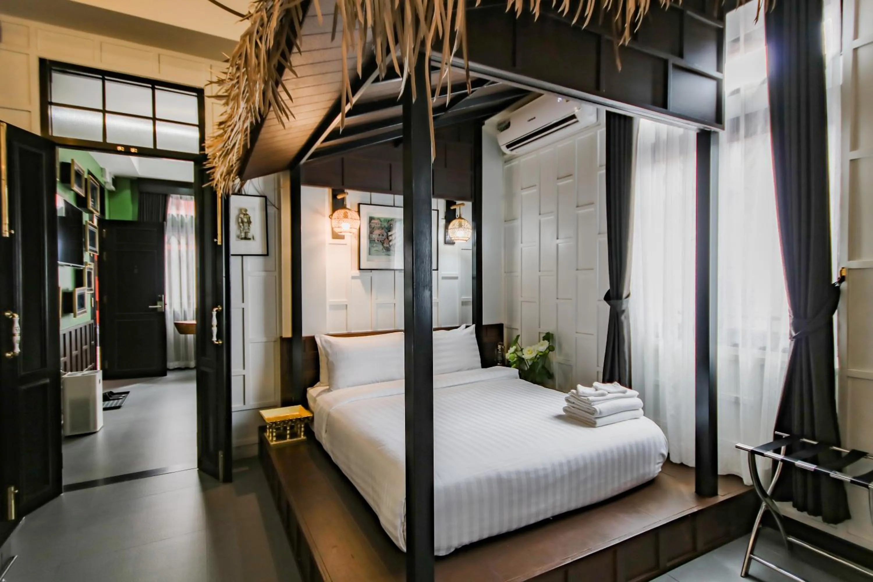 Bed in DE Phanakron Boutique Hotel