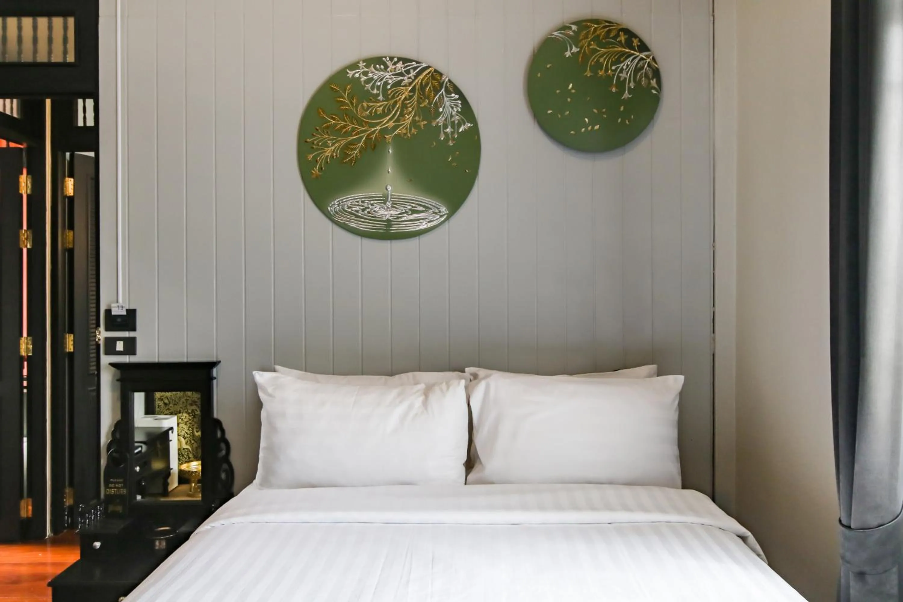 Bed in DE Phanakron Boutique Hotel