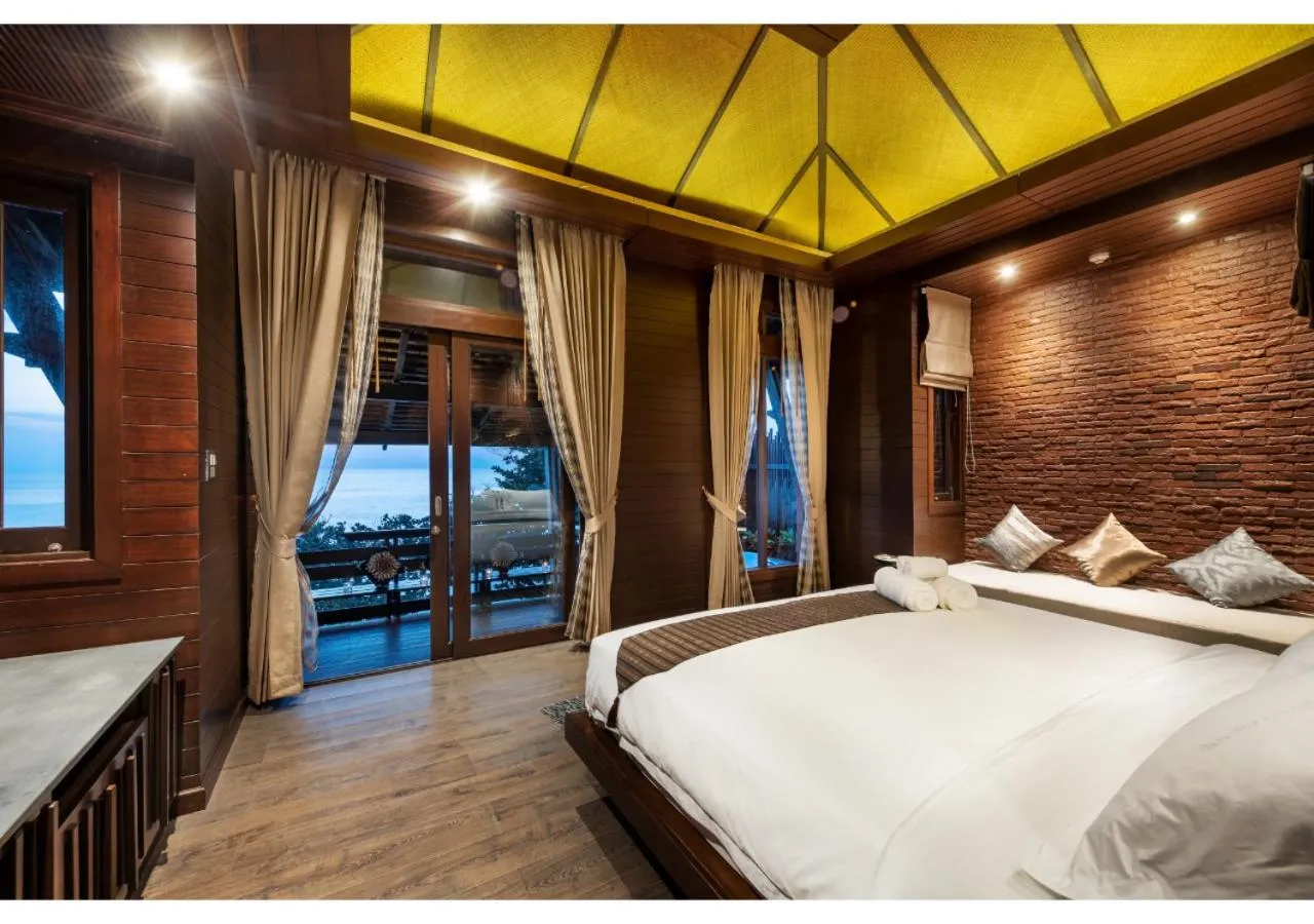 Bed in Nirvana Beach Resort, Koh Lanta SHA Extra Plus