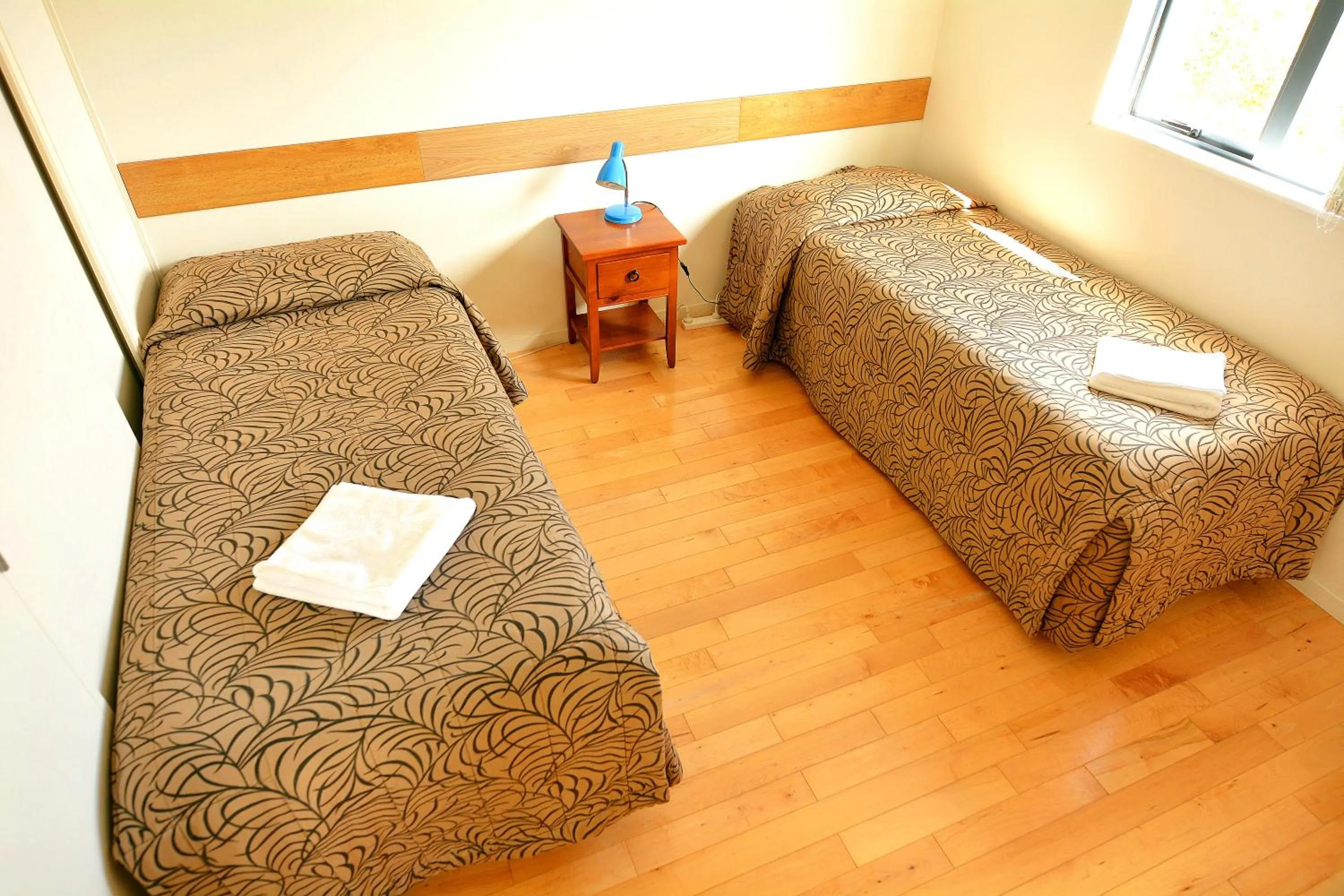 Bed in BeachLife Apartments