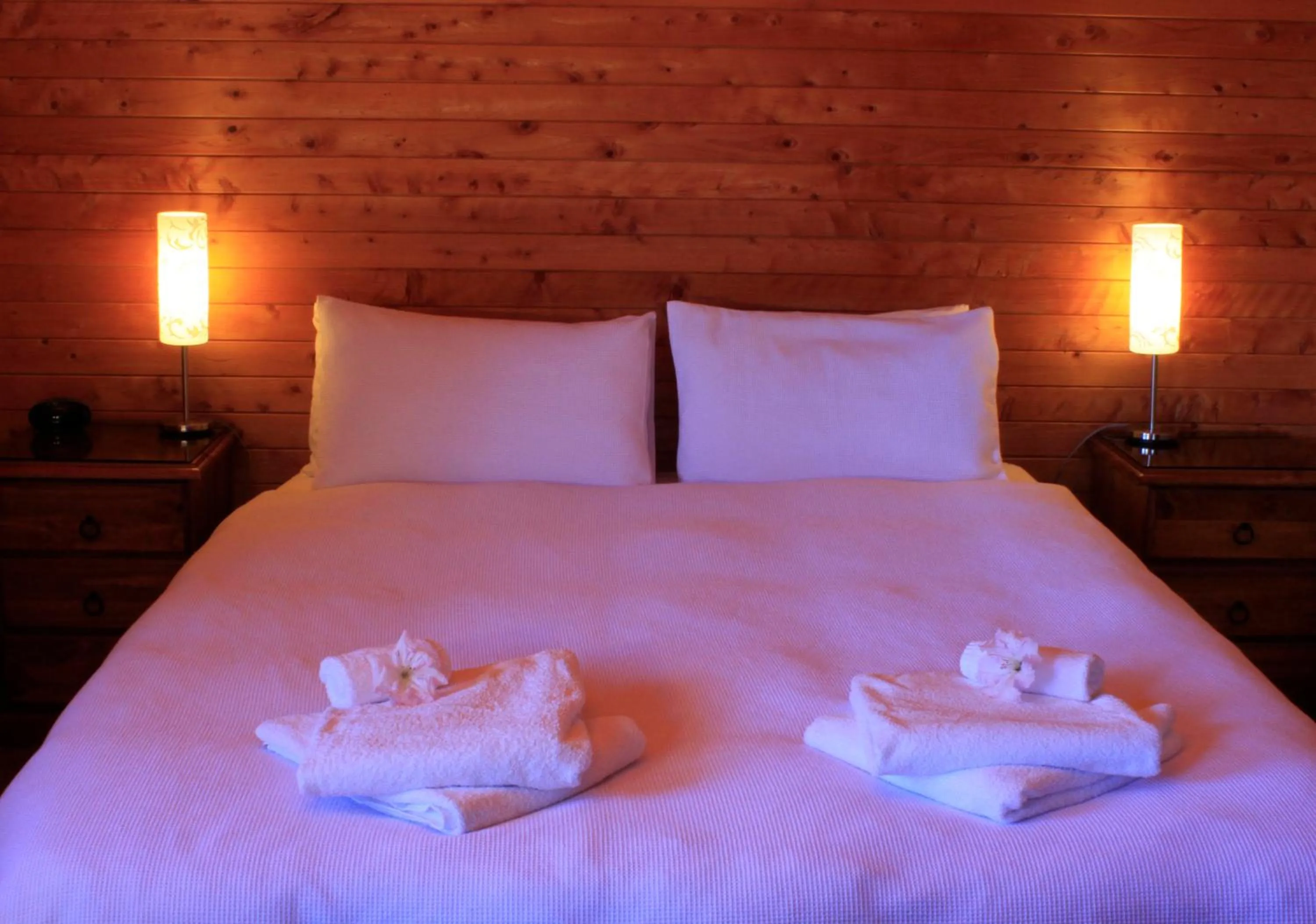 Bed in Kimi Ora Eco Resort