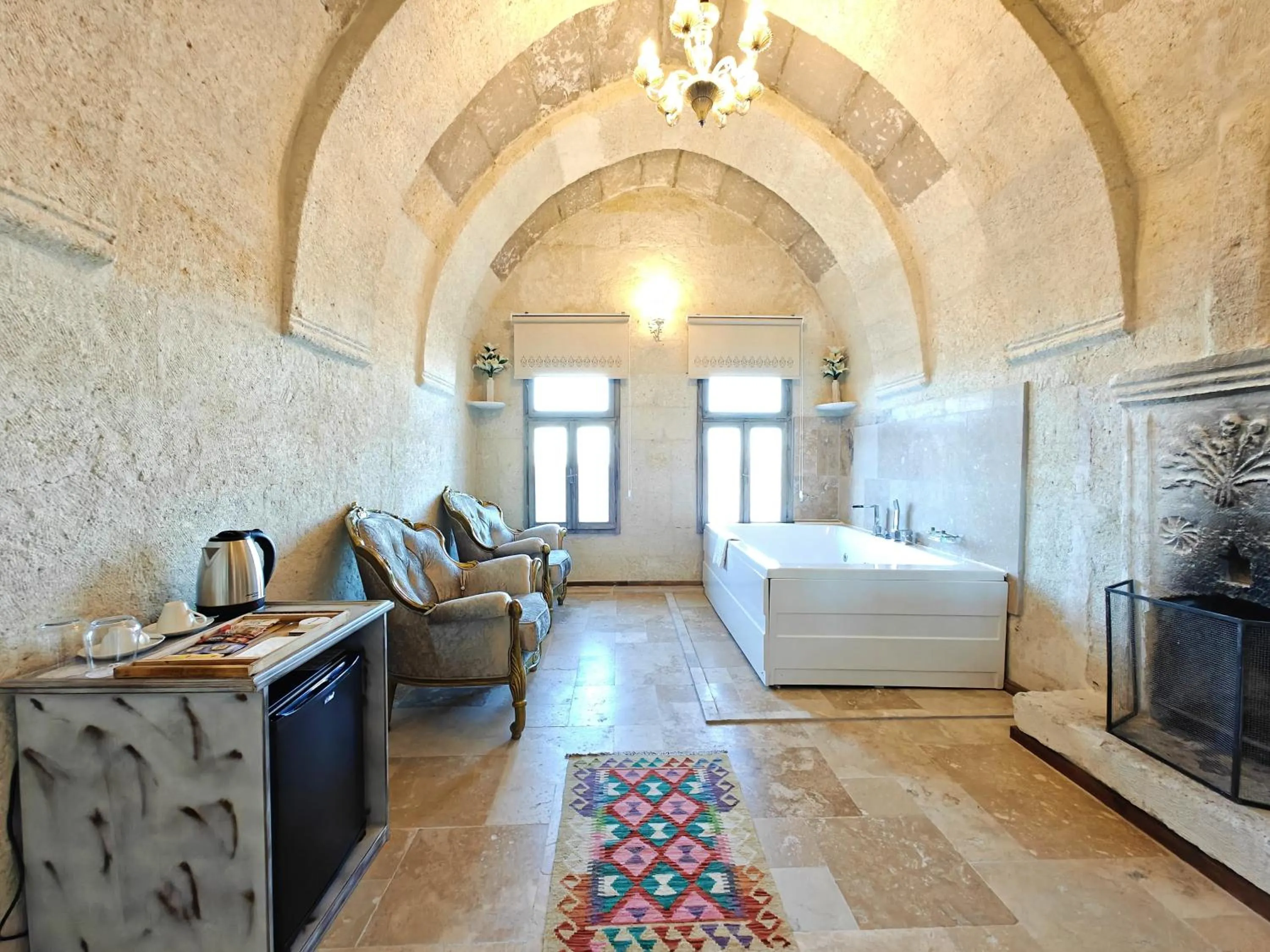 Seating area, Bed in Karlık Cave Suite Cappadocia
