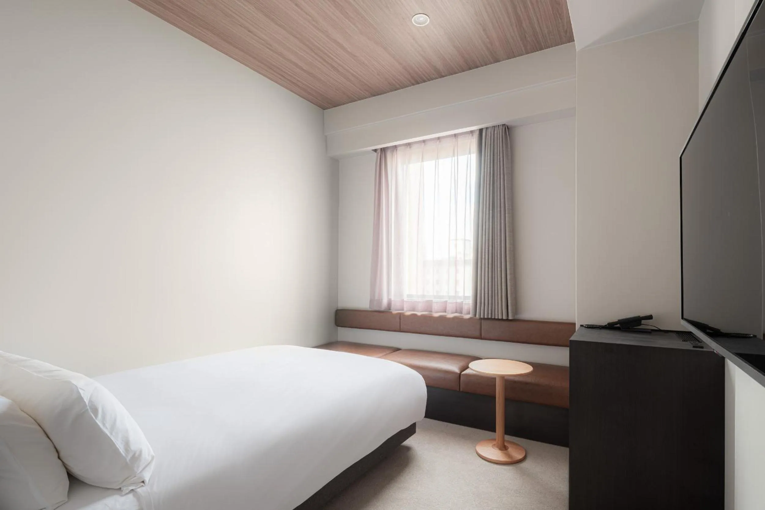 Photo of the whole room, Bed in Nest Hotel Hiroshima Ekimae