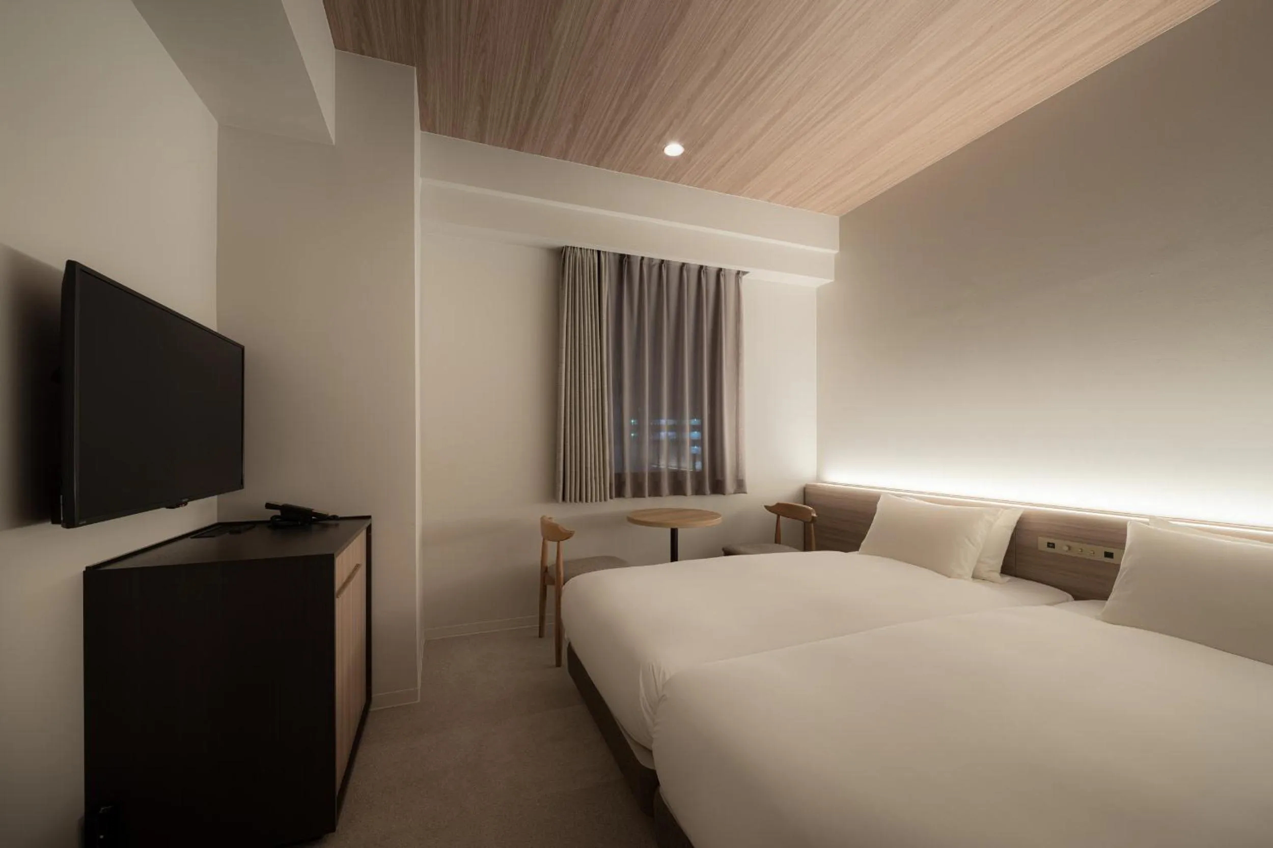 Photo of the whole room, Bed in Nest Hotel Hiroshima Ekimae