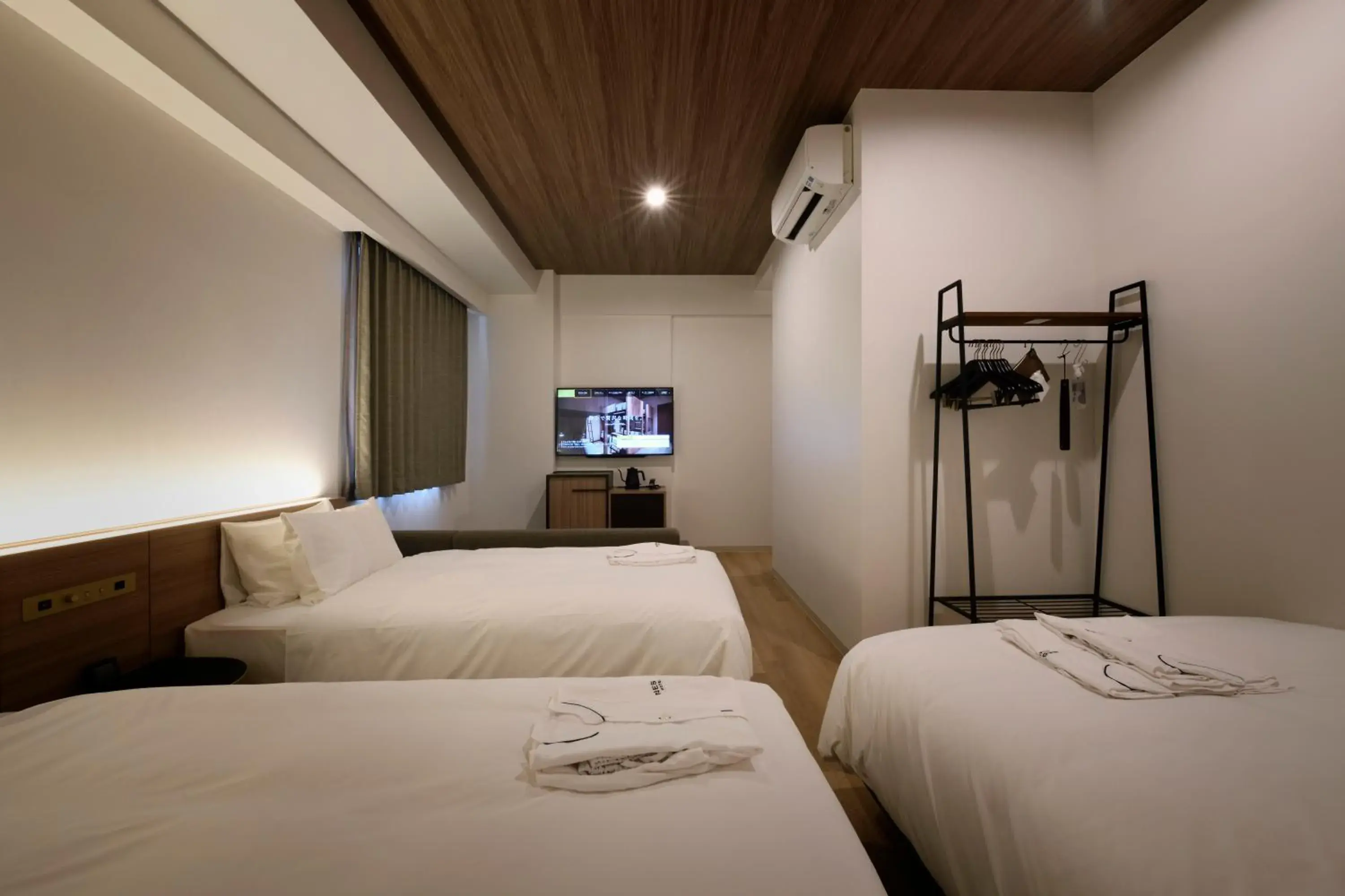 Photo of the whole room, Bed in Nest Hotel Hiroshima Ekimae Photo of the whole room, Bed in Nest Hotel Hiroshima Ekimae