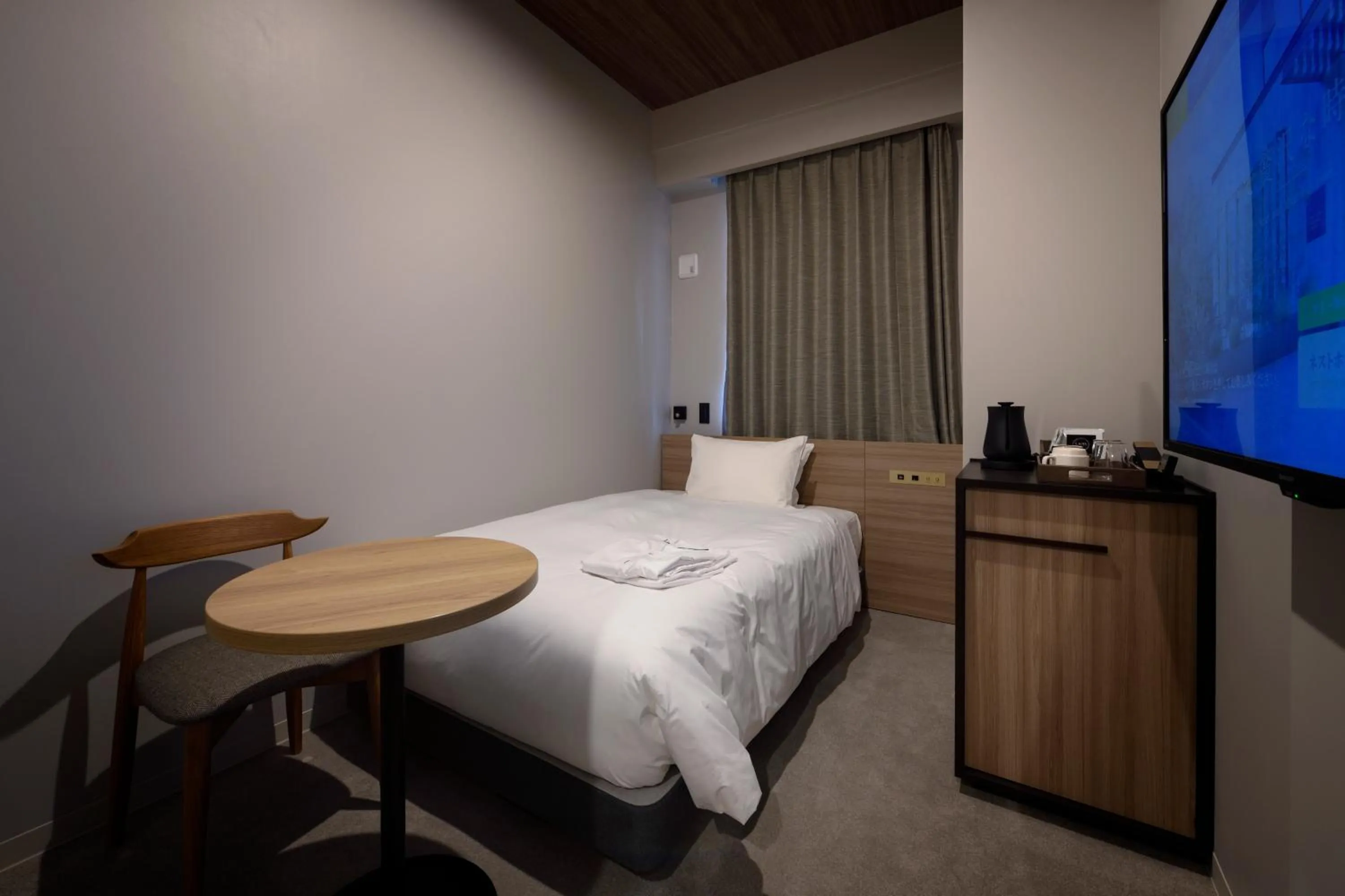 Photo of the whole room, Bed in Nest Hotel Hiroshima Ekimae