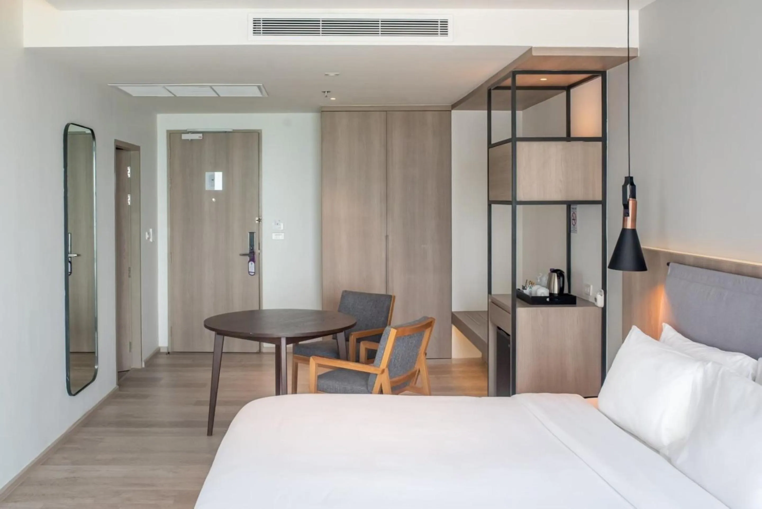 Photo of the whole room, Bed in Fortune Saeng Chan Beach Hotel Rayong - SHA Plus