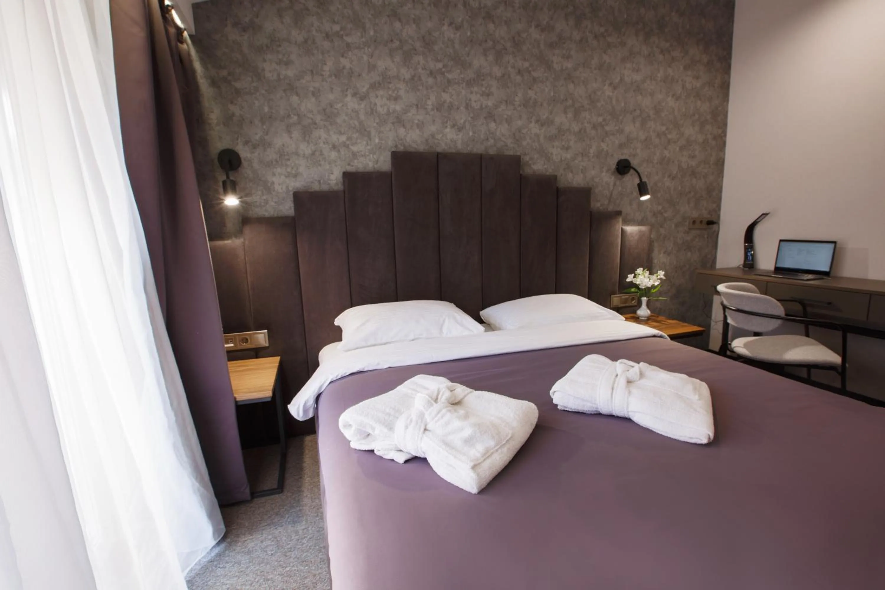 Bed in Kulikovskiy hotel