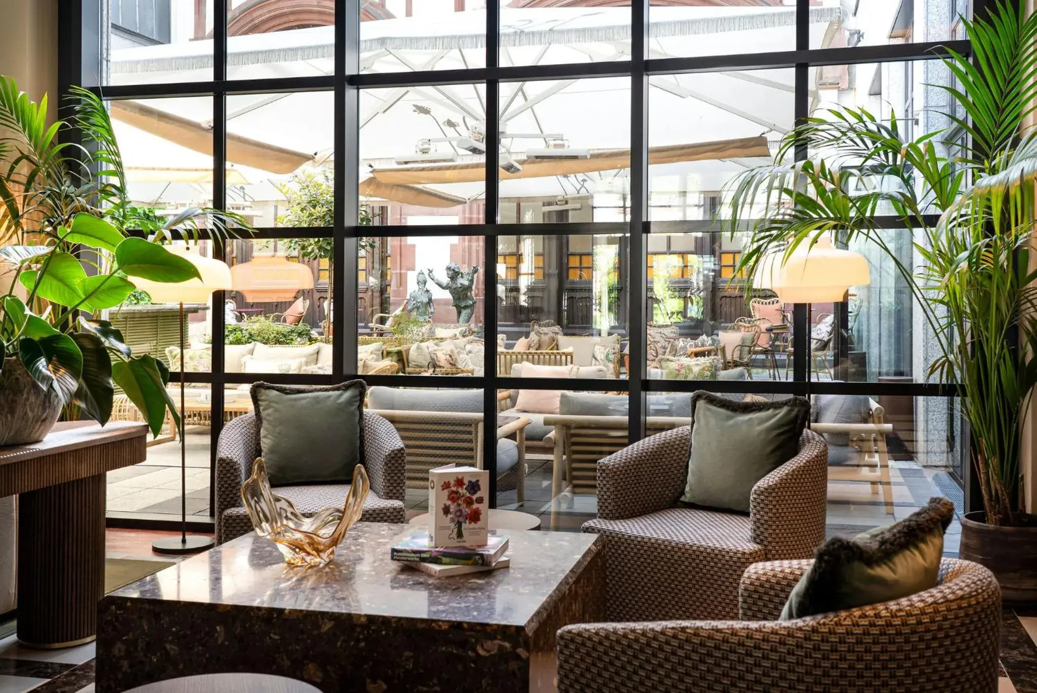 Inner courtyard view in Brunfels Hotel, in the Unbound Collection by Hyatt Inner courtyard view in Brunfels Hotel, in the Unbound Collection by Hyatt