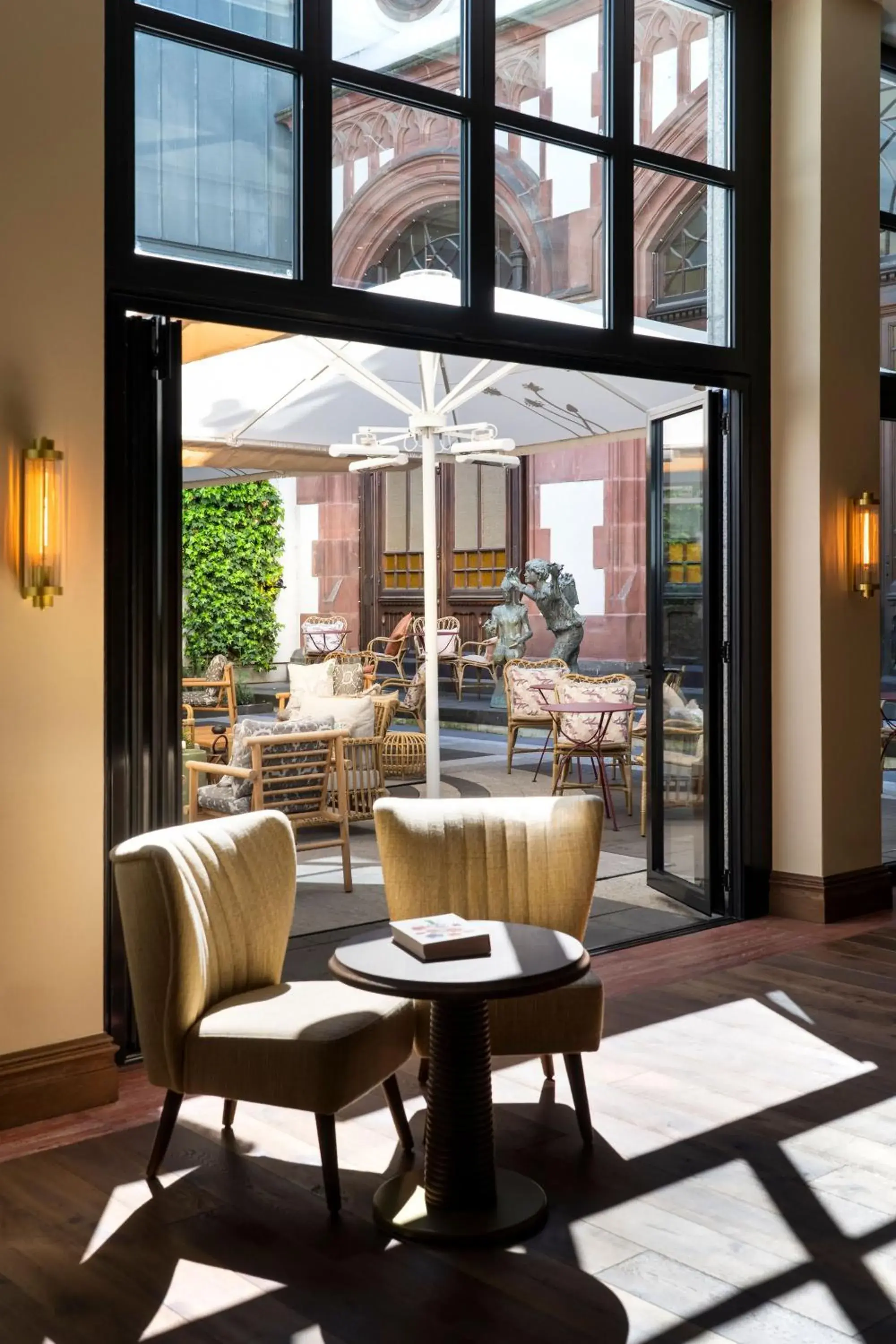 Inner courtyard view in Brunfels Hotel, in the Unbound Collection by Hyatt Inner courtyard view in Brunfels Hotel, in the Unbound Collection by Hyatt