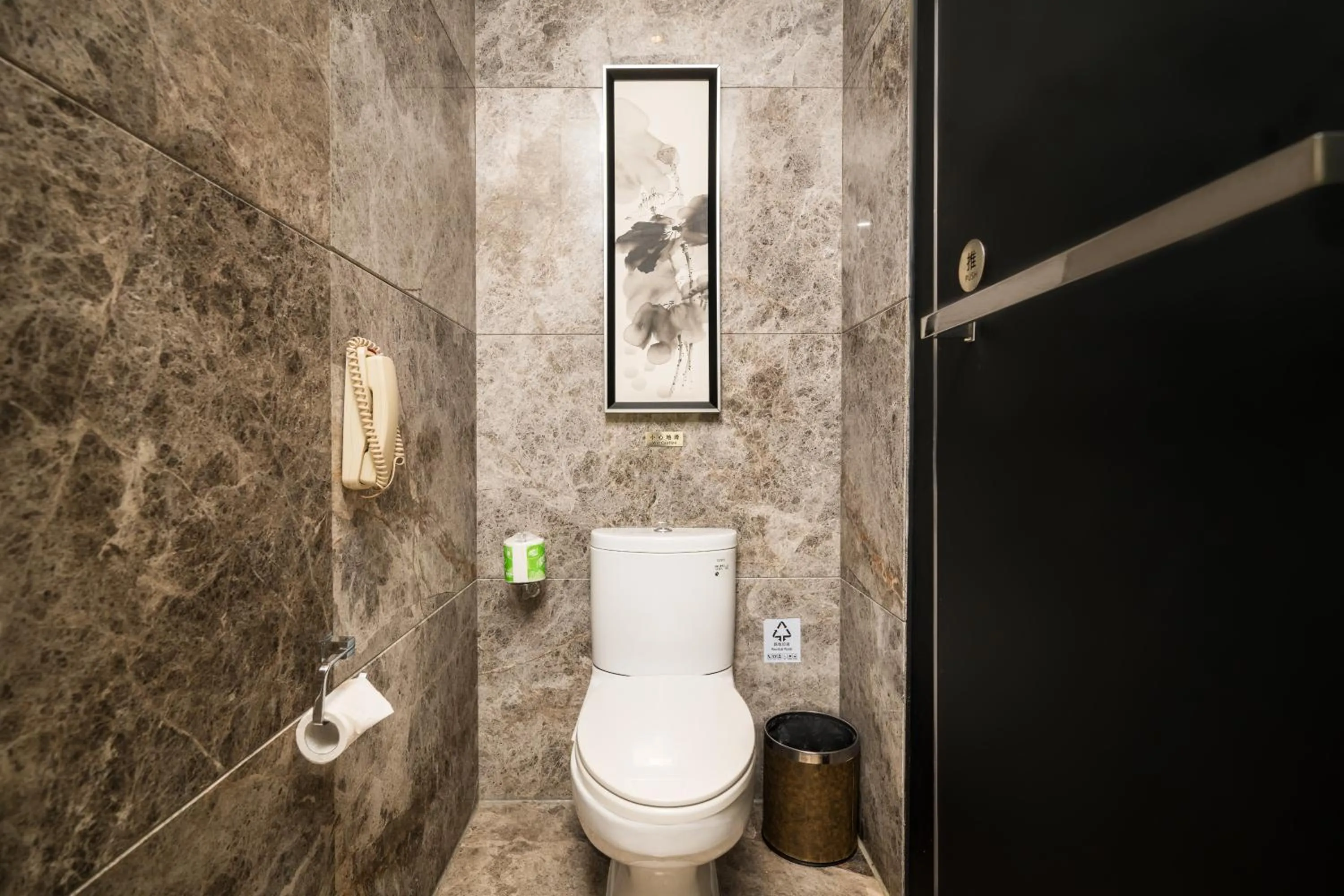 Bathroom in Paco Hotel Tаojin Metro Guangzhou