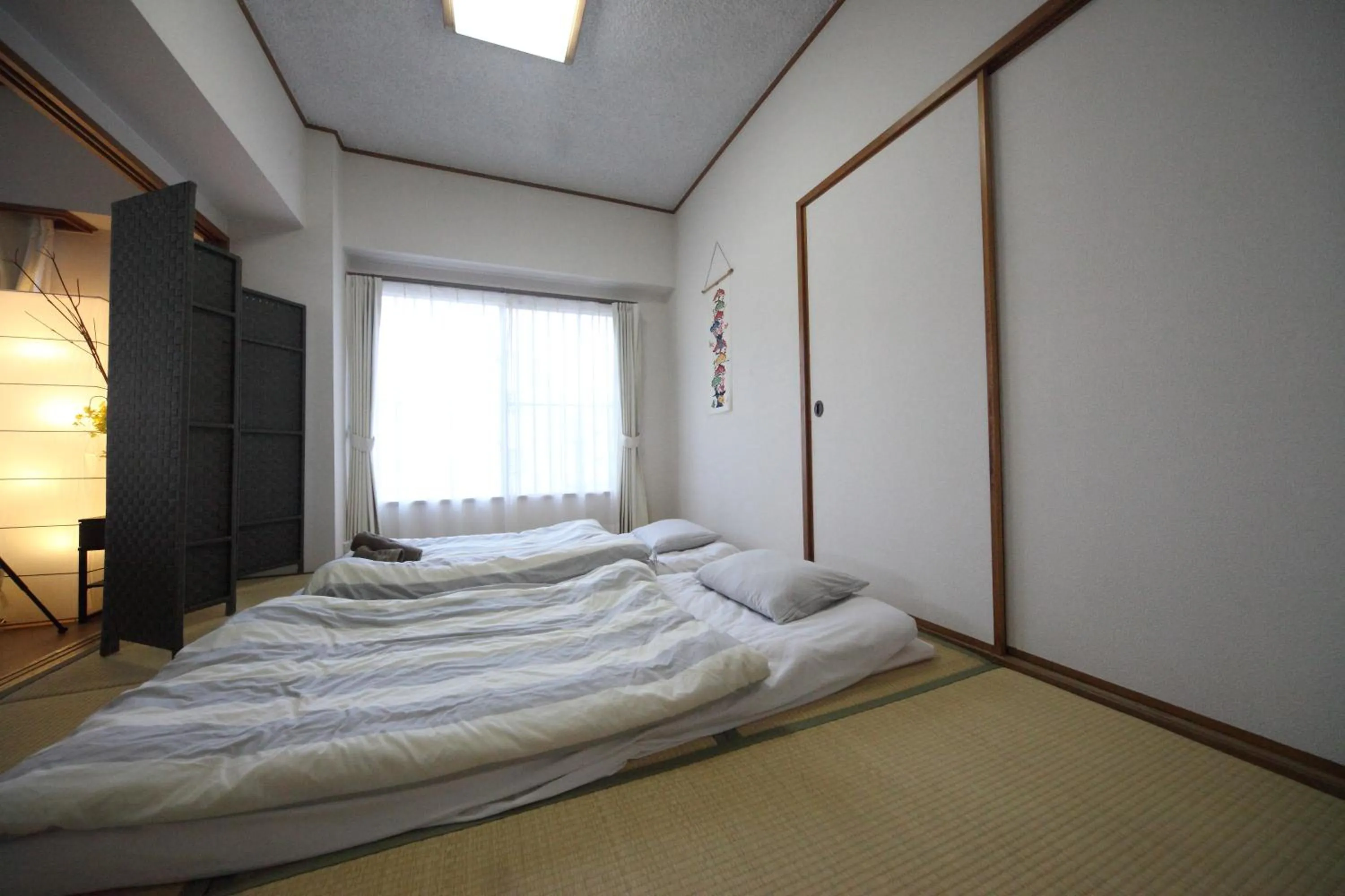 Photo of the whole room, Bed in Exsaison house Kumoji
