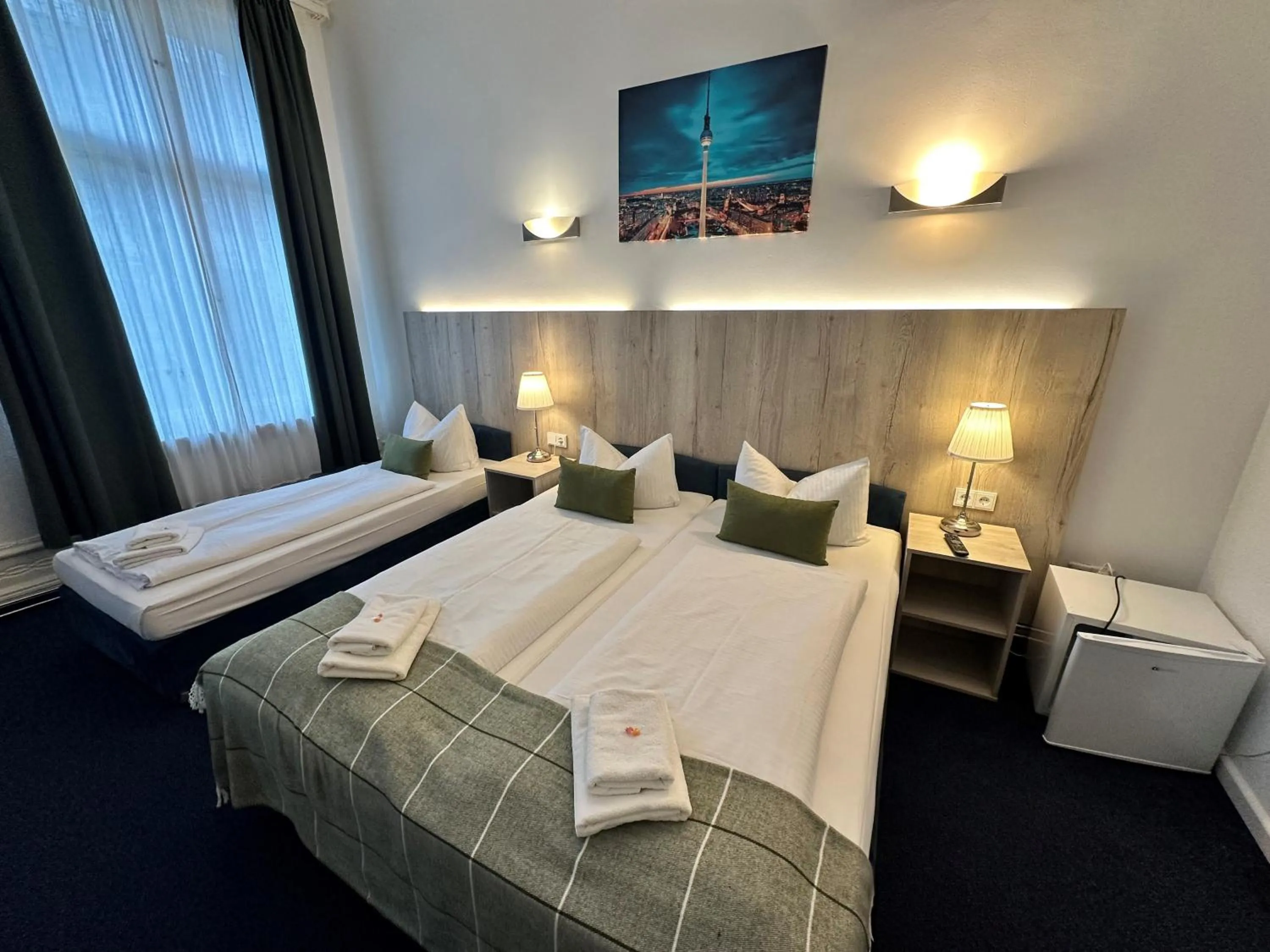 Bed in Hotel Seifert Berlin am Kurfürstendamm