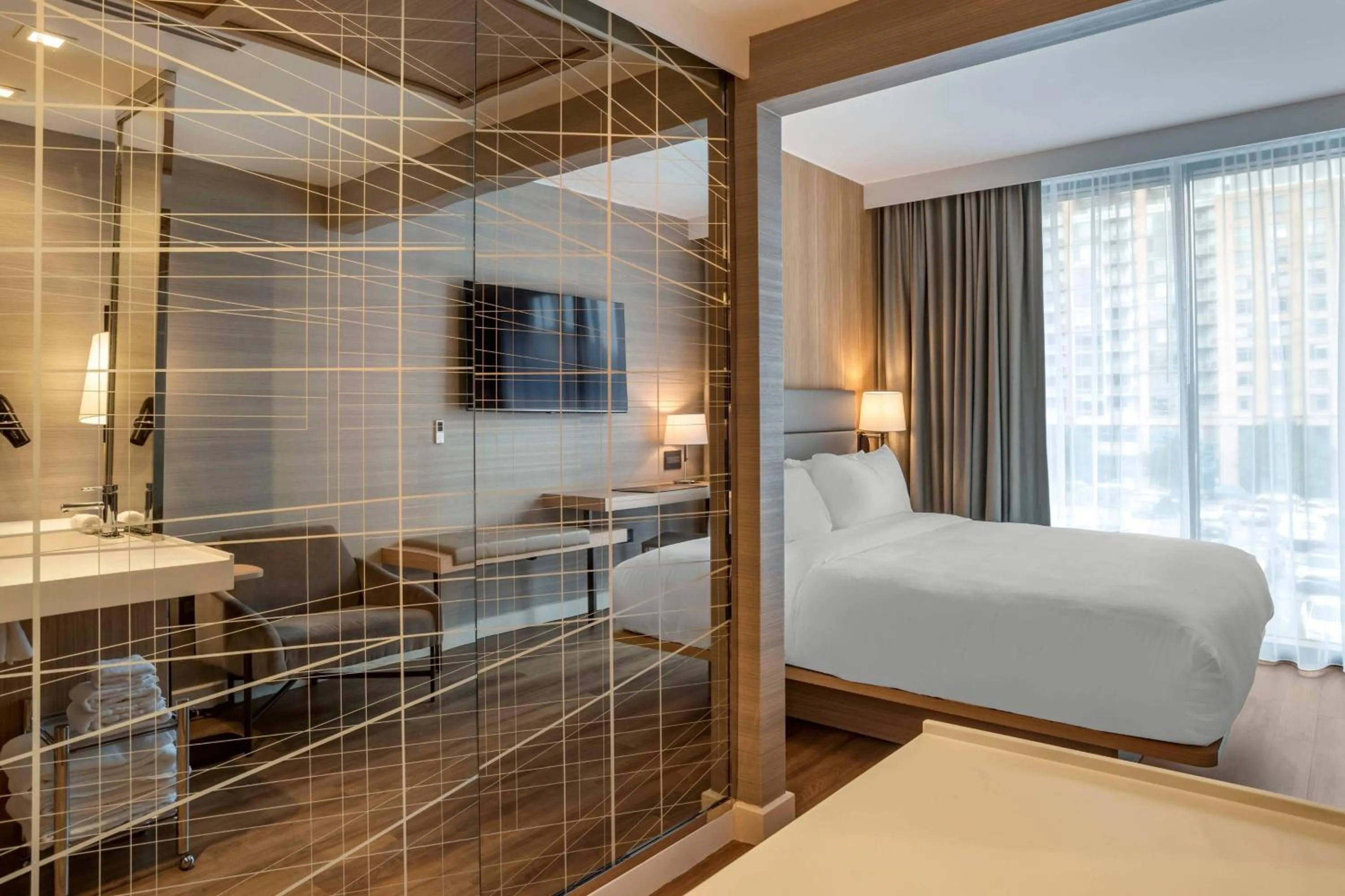 Photo of the whole room, Bed in AC Hotel by Marriott Washington DC Convention Center