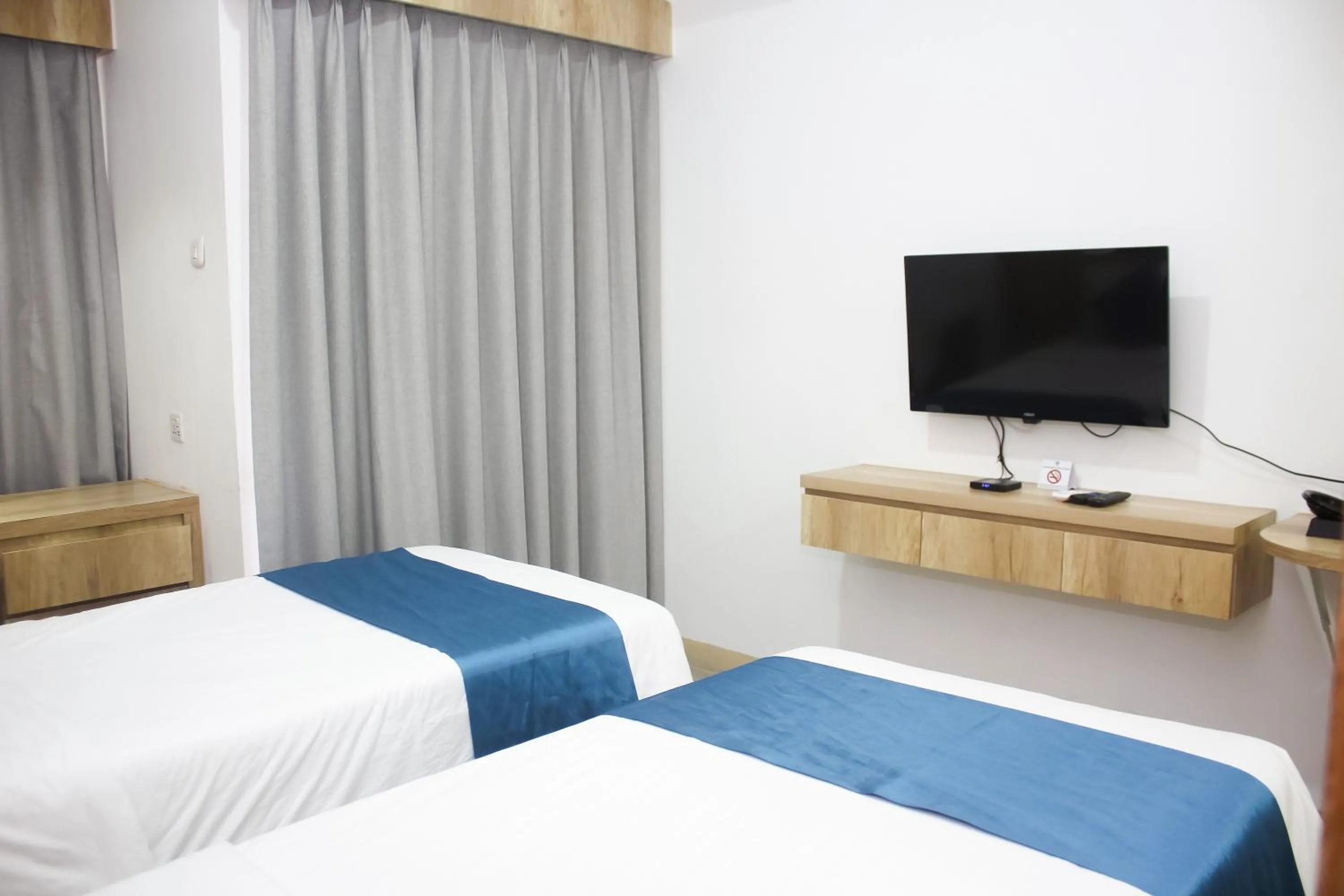Bed in Urban Hotel Serpong