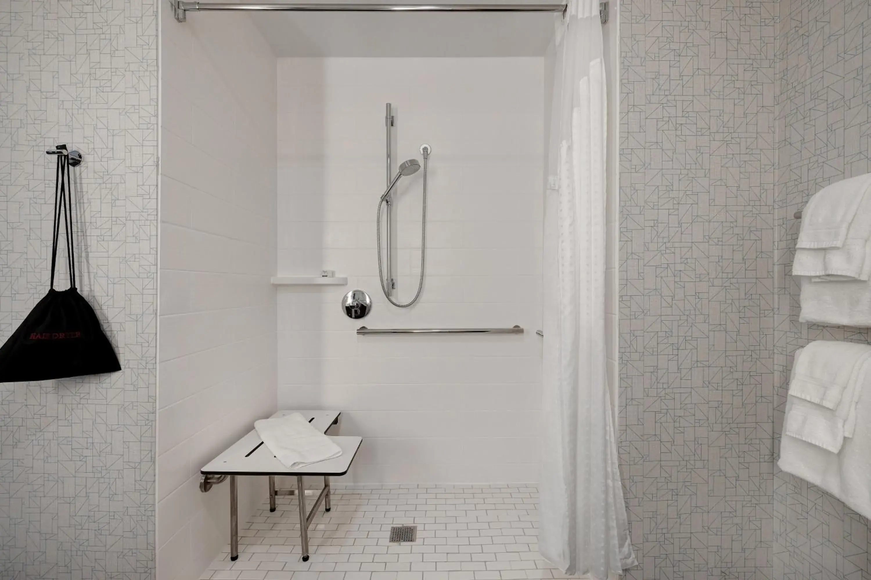 Standard King Room with Roll-in Shower - Mobility Accessible in Holiday Inn Express & Suites - Grand Rapids South - Wyoming by IHG Standard King Room with Roll-in Shower - Mobility Accessible in Holiday Inn Express & Suites - Grand Rapids South - Wyoming by IHG