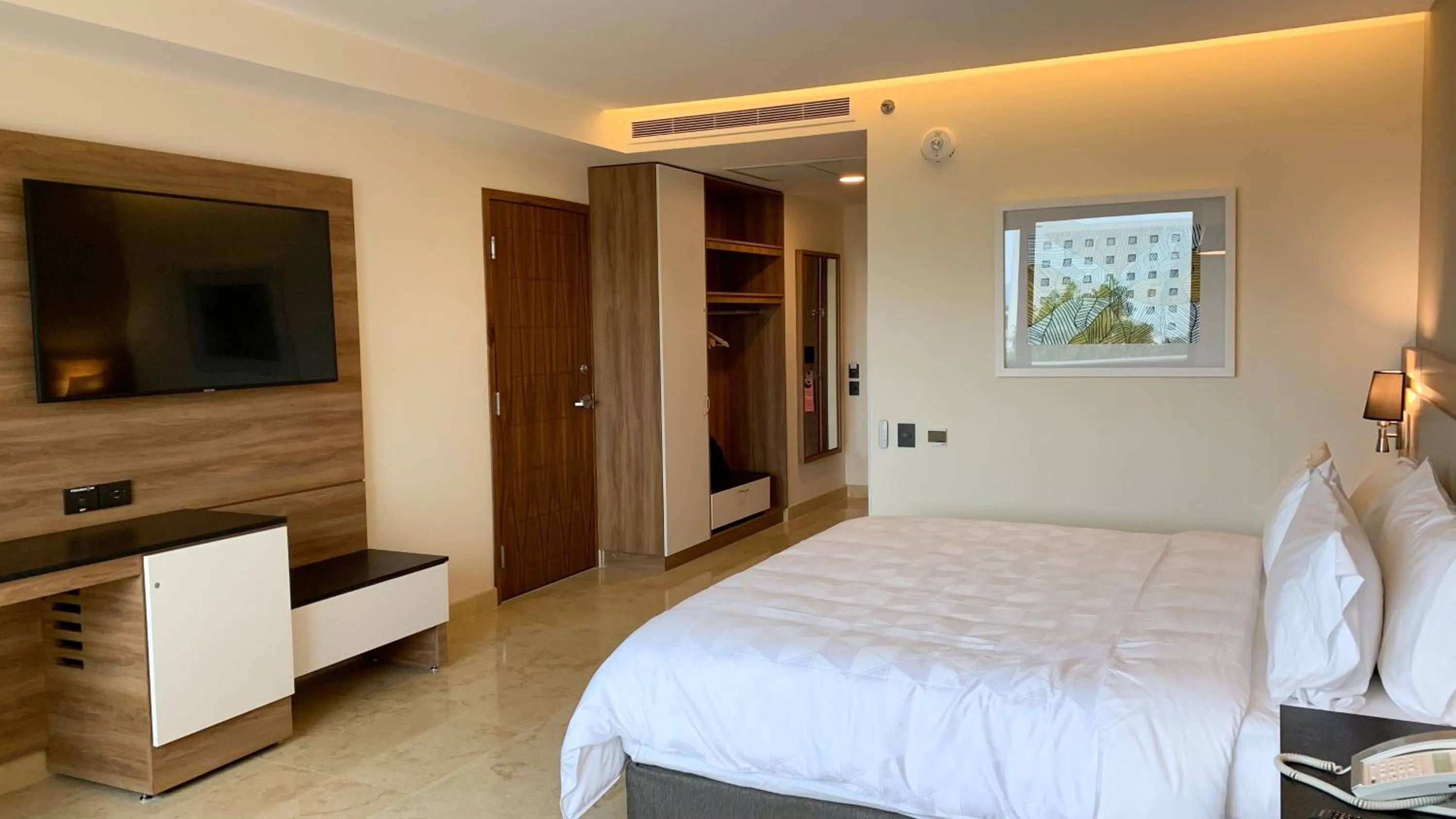 Photo of the whole room, Bed in Holiday Inn & Suites - Puerto Vallarta Marina & Golf by IHG