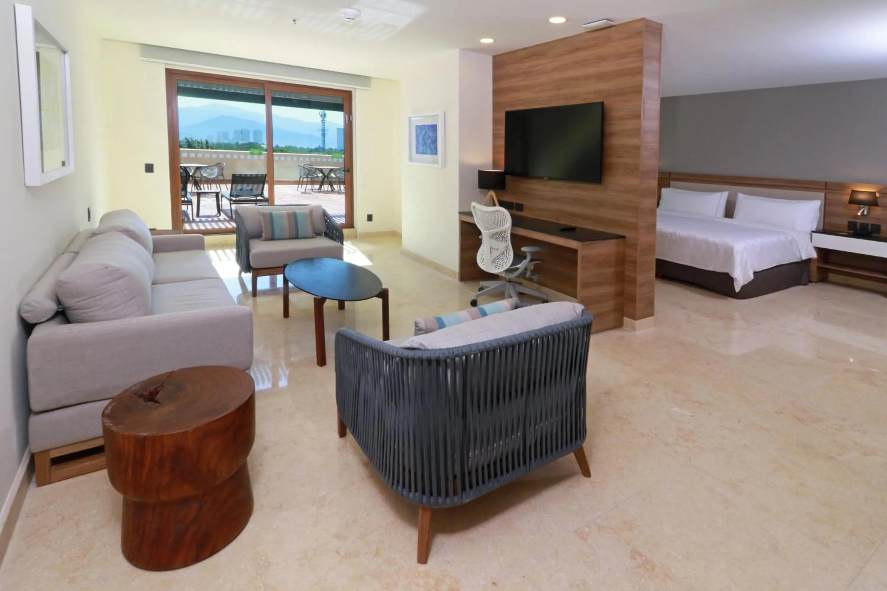 Photo of the whole room, Bed in Holiday Inn & Suites - Puerto Vallarta Marina & Golf by IHG