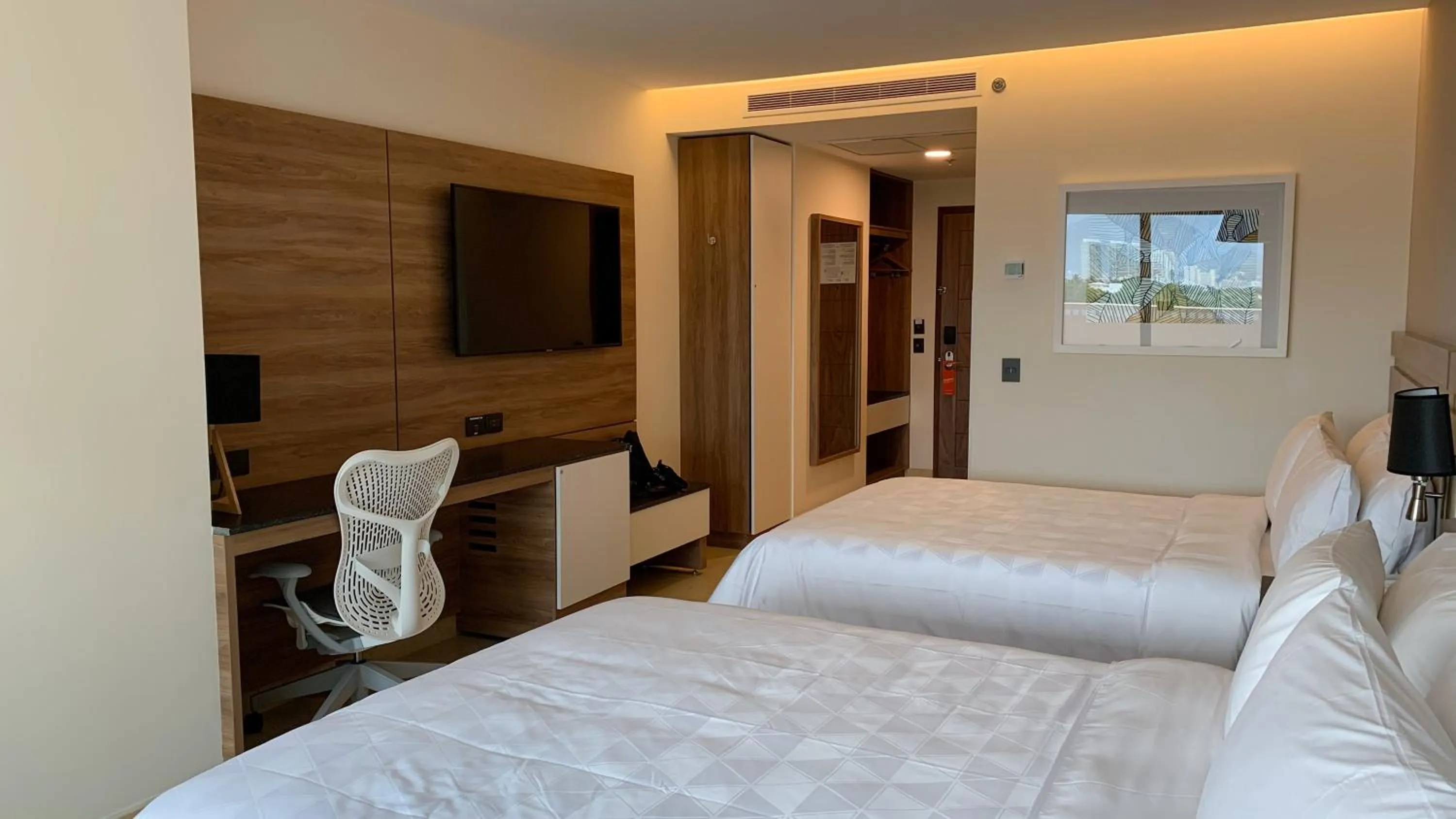 Photo of the whole room, Bed in Holiday Inn & Suites - Puerto Vallarta Marina & Golf by IHG