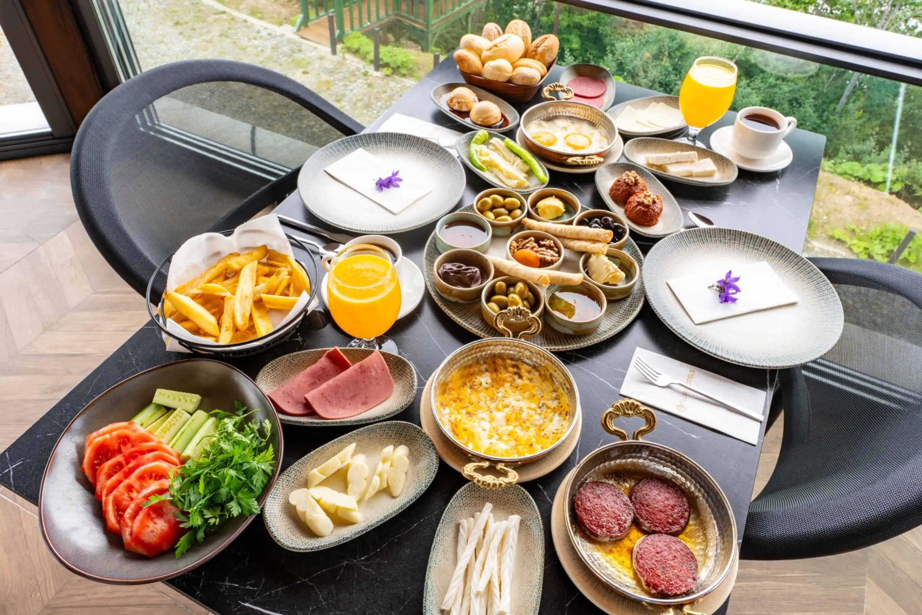 Continental breakfast in Flora Handüzü Resort & Wellness Bungalow Hotel