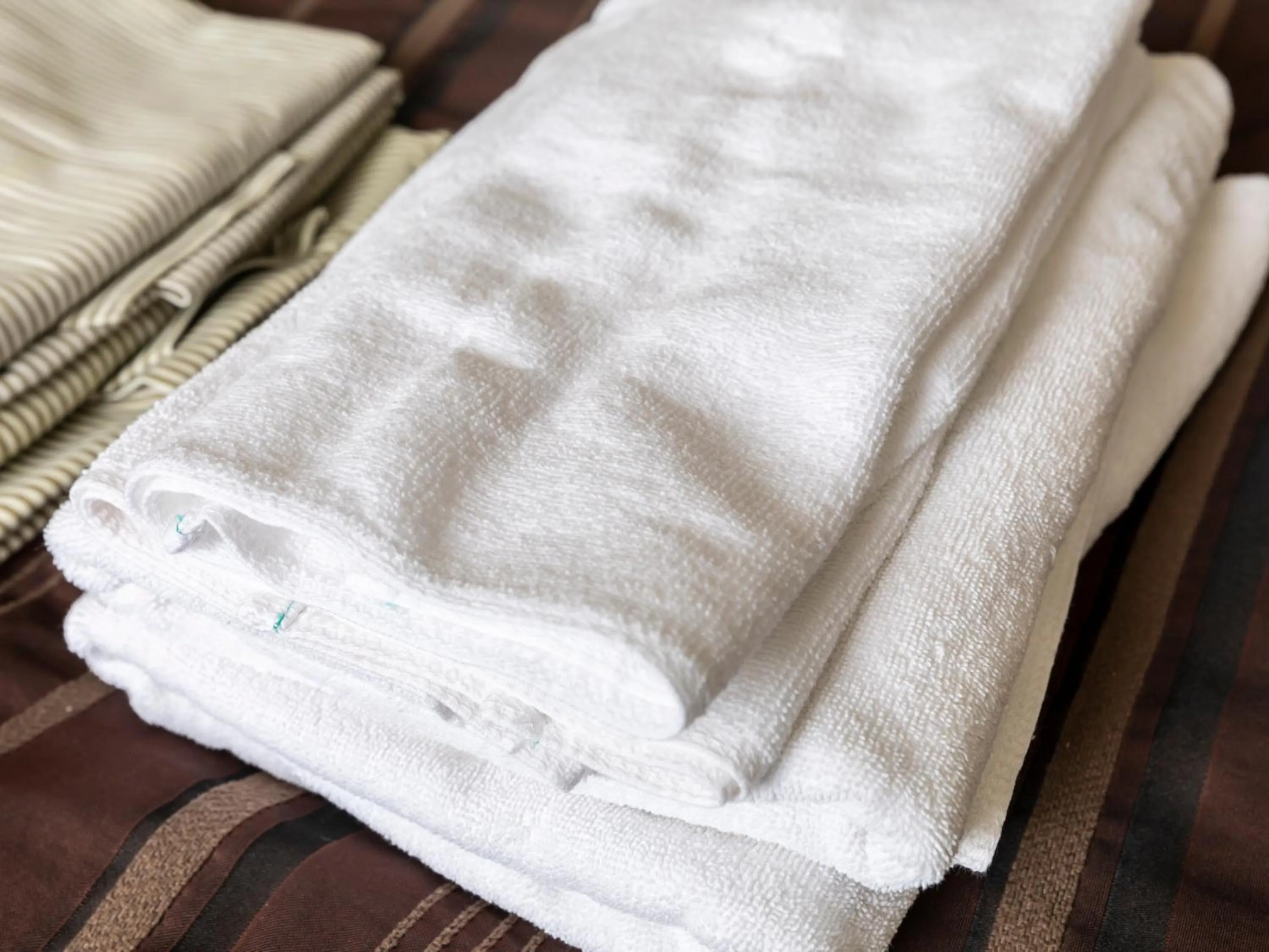 towels, Bed in Tabist Hotel Kurama Hikone