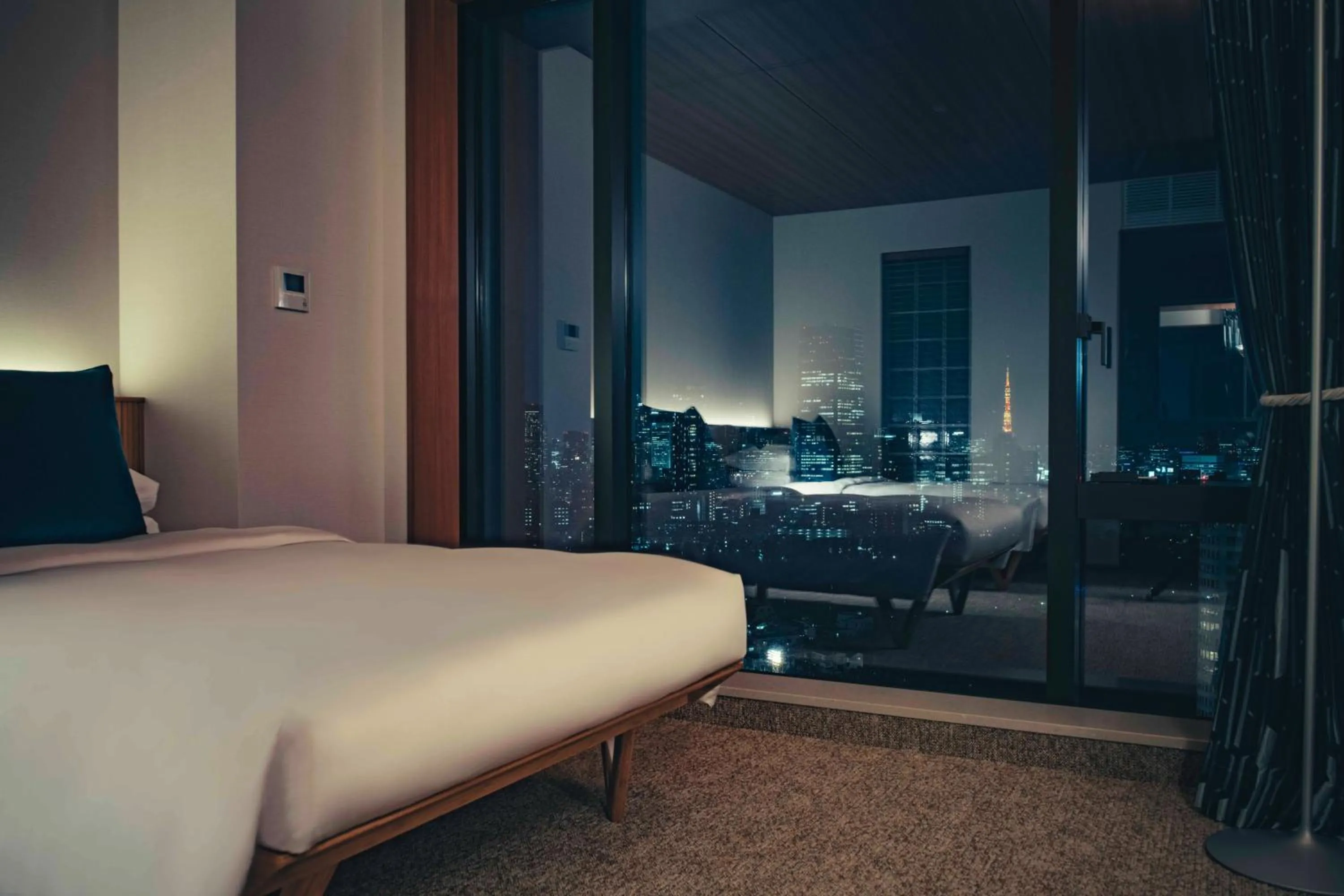 Bed in THE AOYAMA GRAND HOTEL