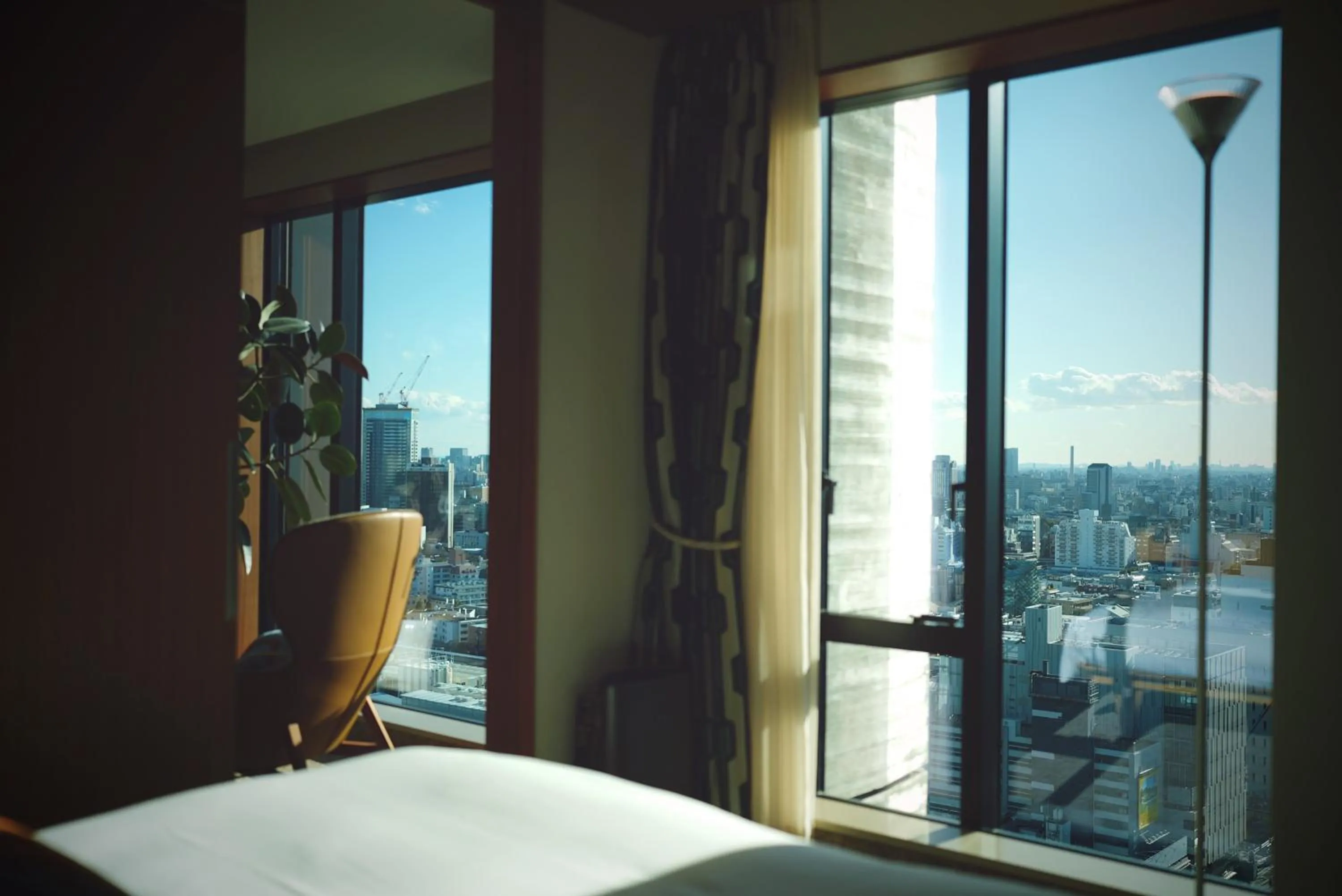 Bed in THE AOYAMA GRAND HOTEL