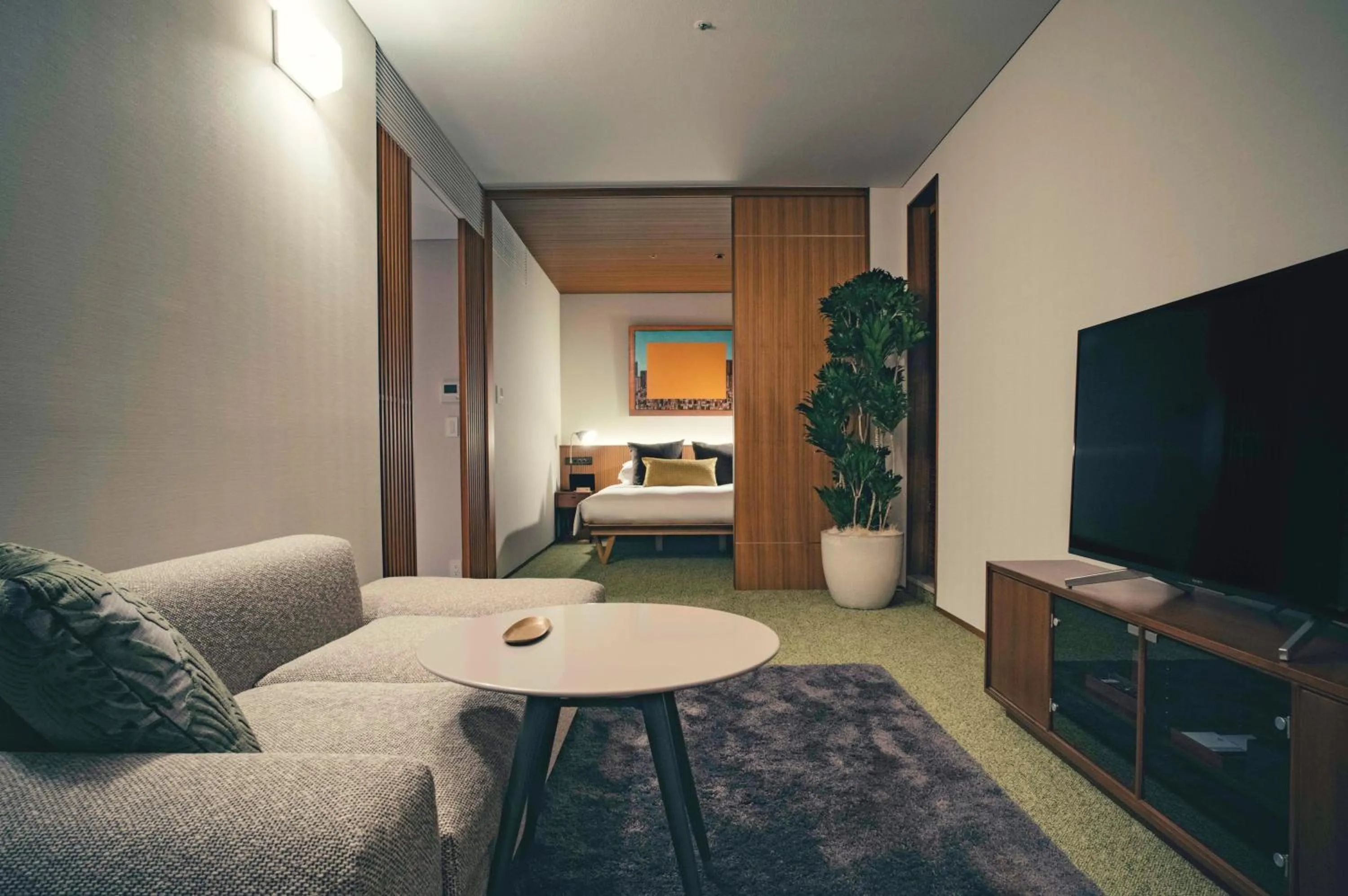 Bed in THE AOYAMA GRAND HOTEL