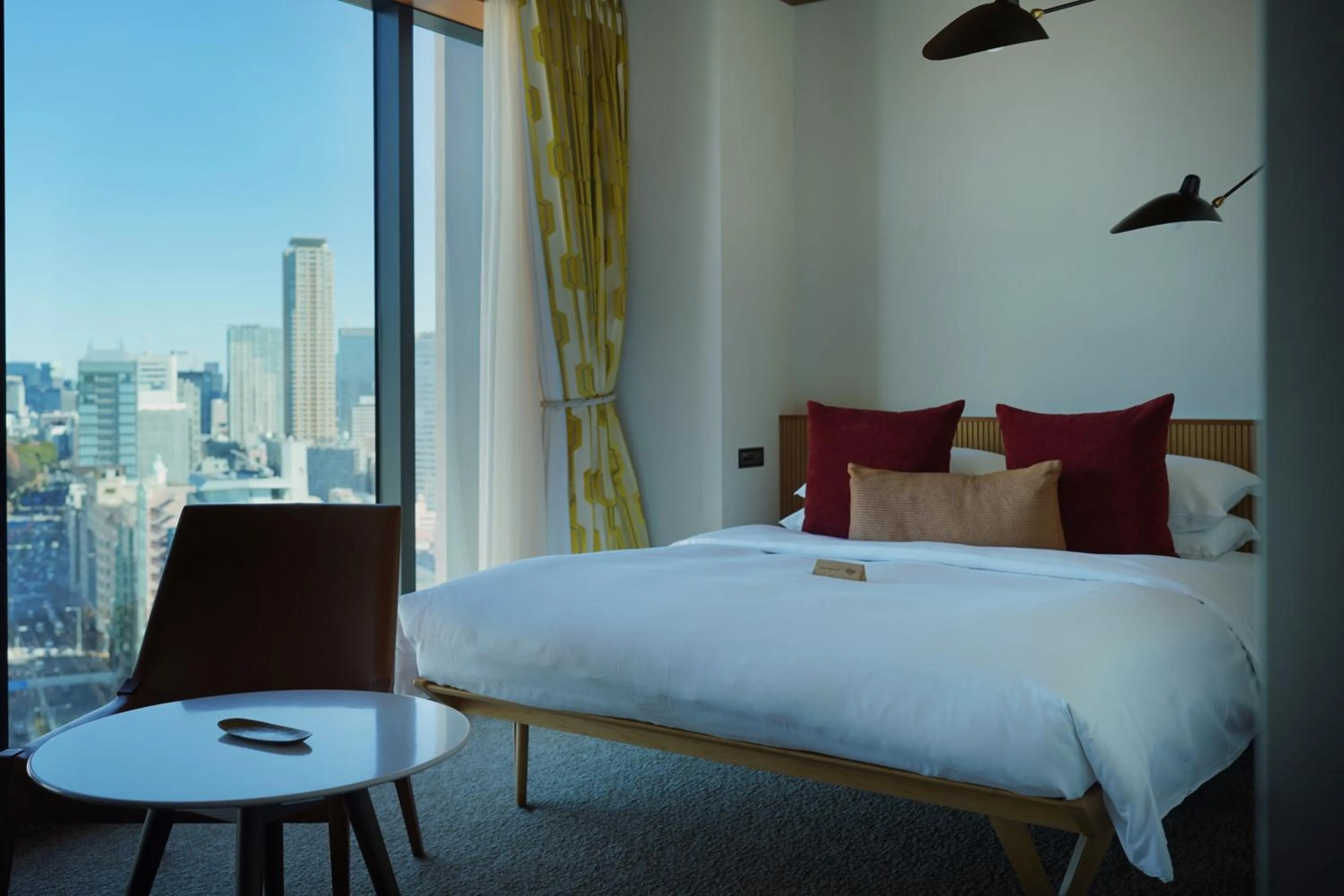 Bed in THE AOYAMA GRAND HOTEL