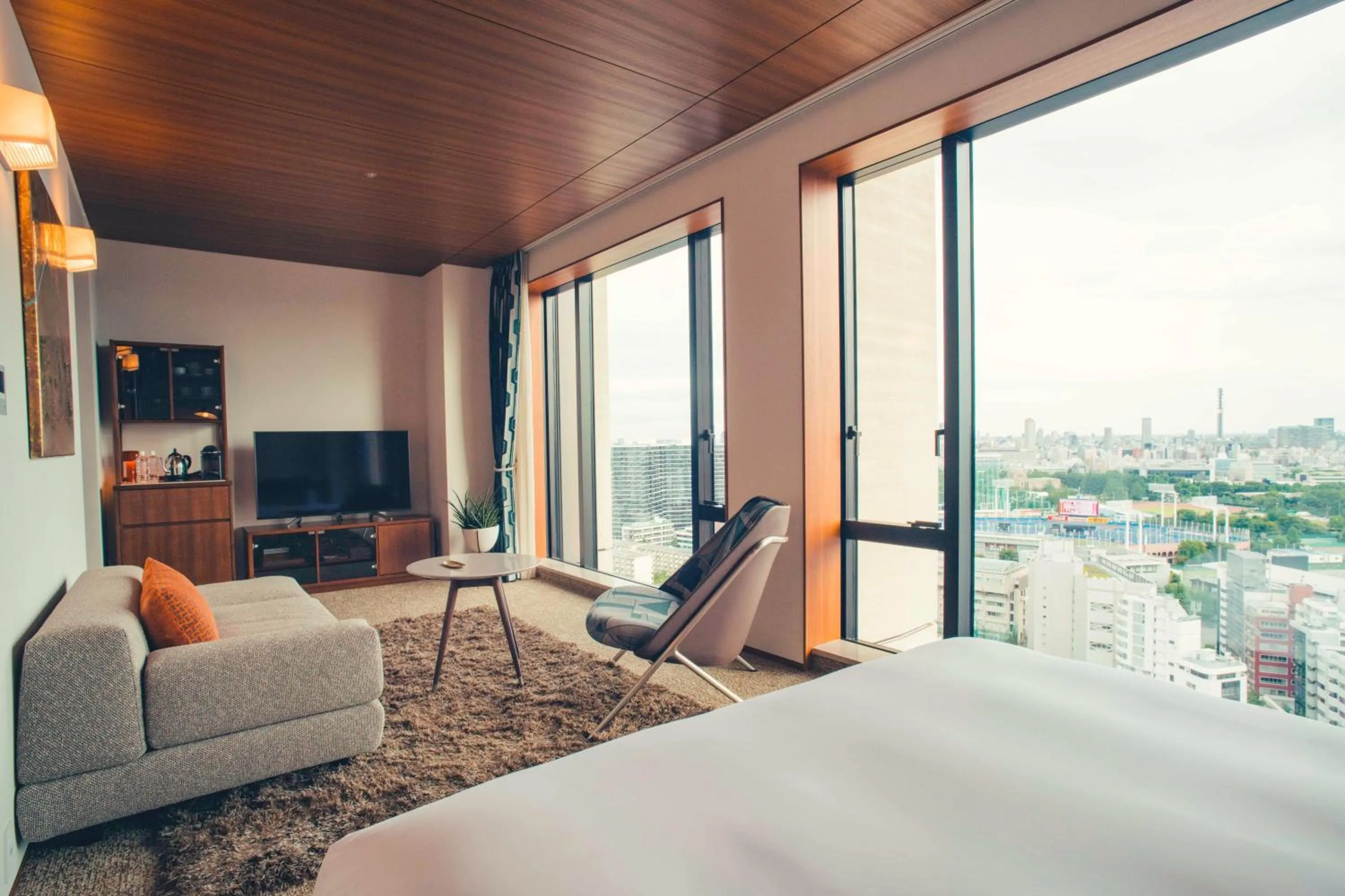 Bed in THE AOYAMA GRAND HOTEL