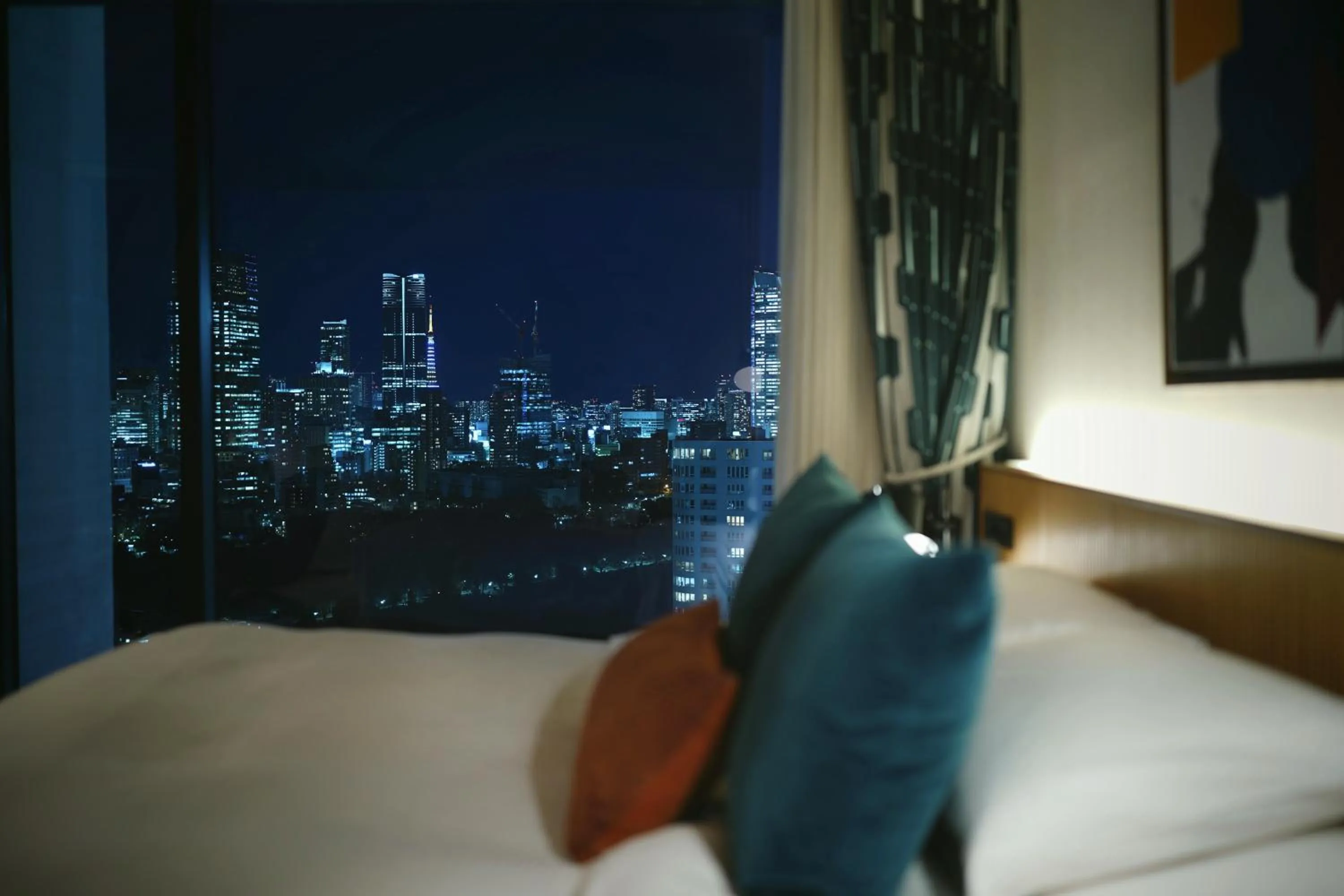 Bed in THE AOYAMA GRAND HOTEL