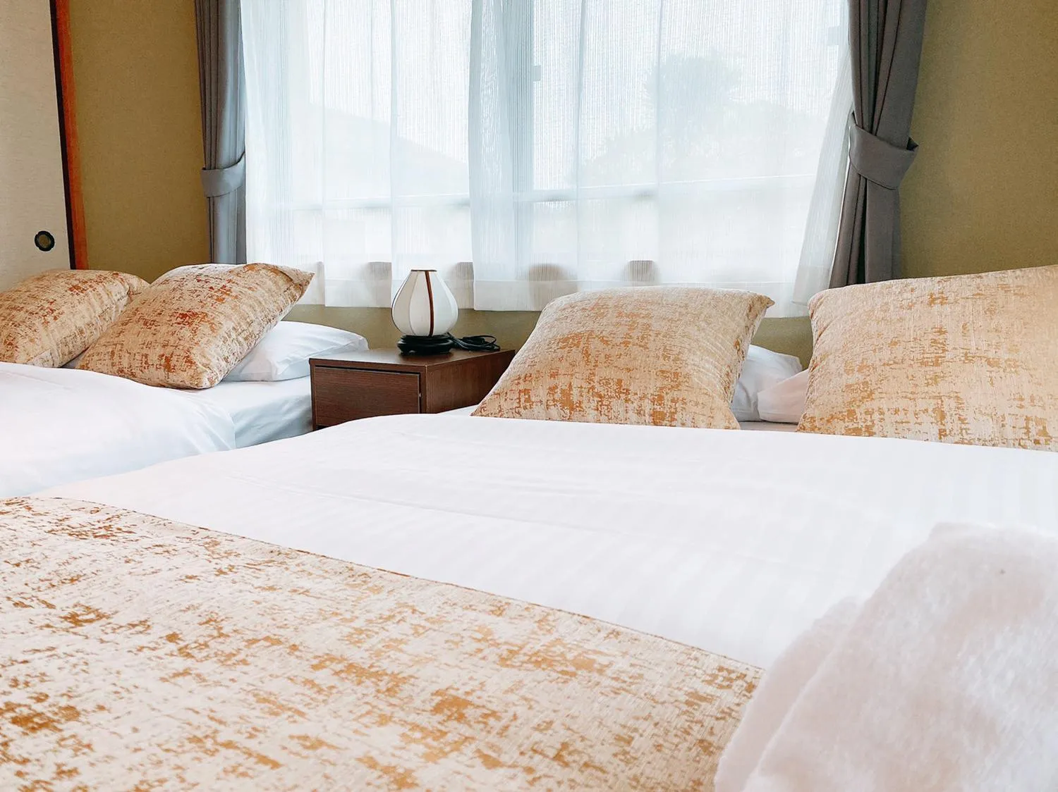 Bed in OUCHI HOTEL Itsukaichi