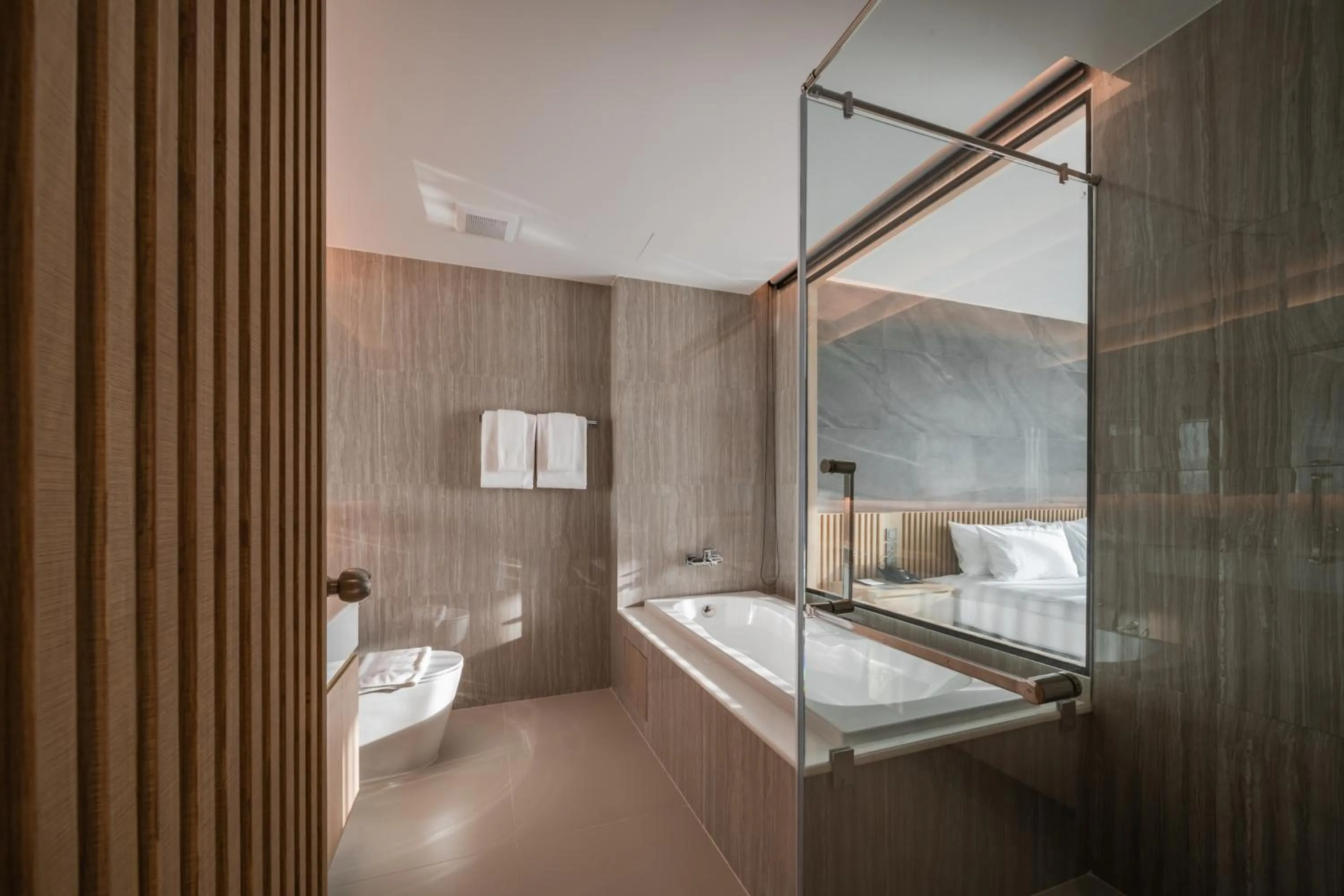 Bathroom, Bed in Mandarin Eastville, Pattaya - SHA Extra Plus